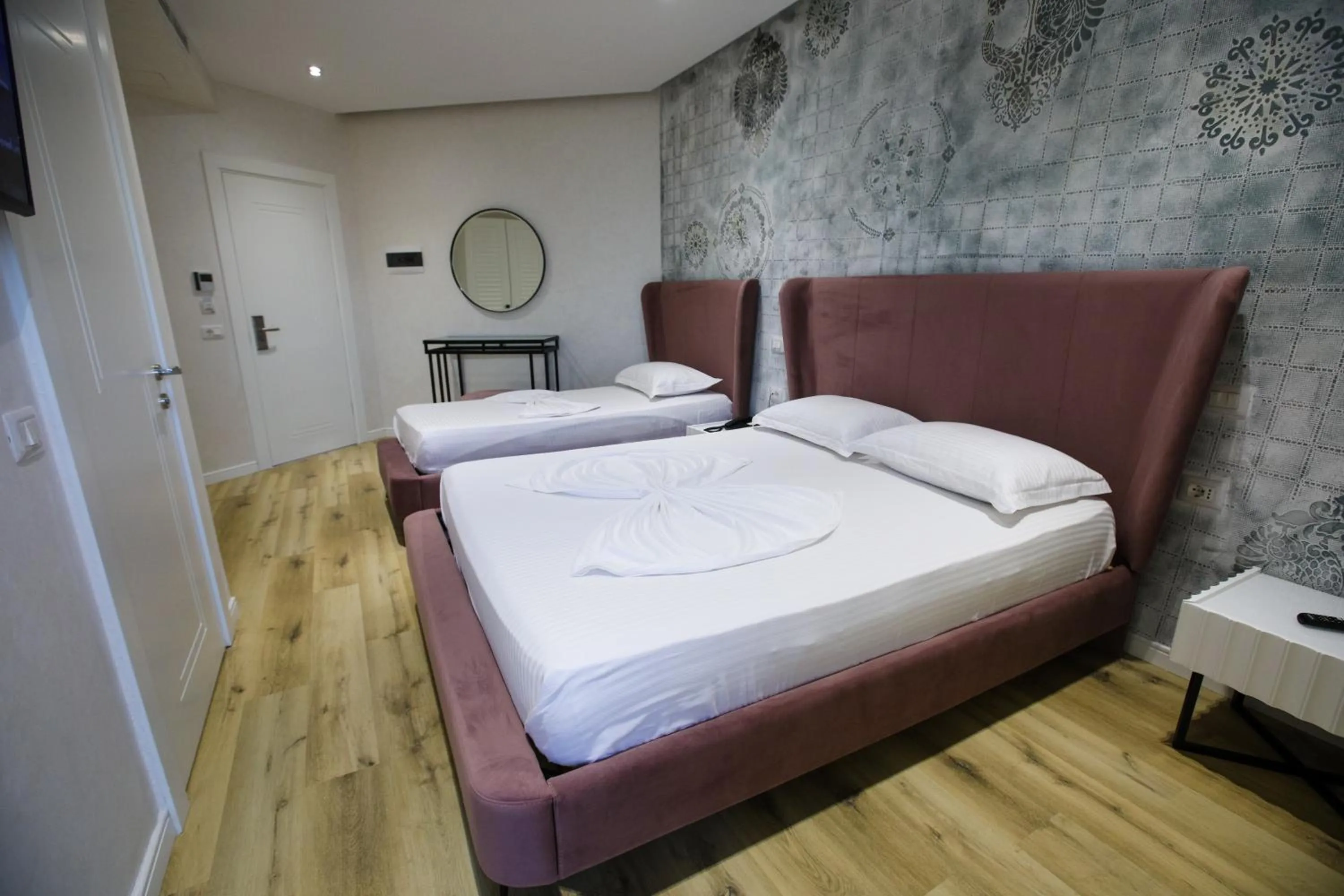 Bed in HH Boutique Hotel