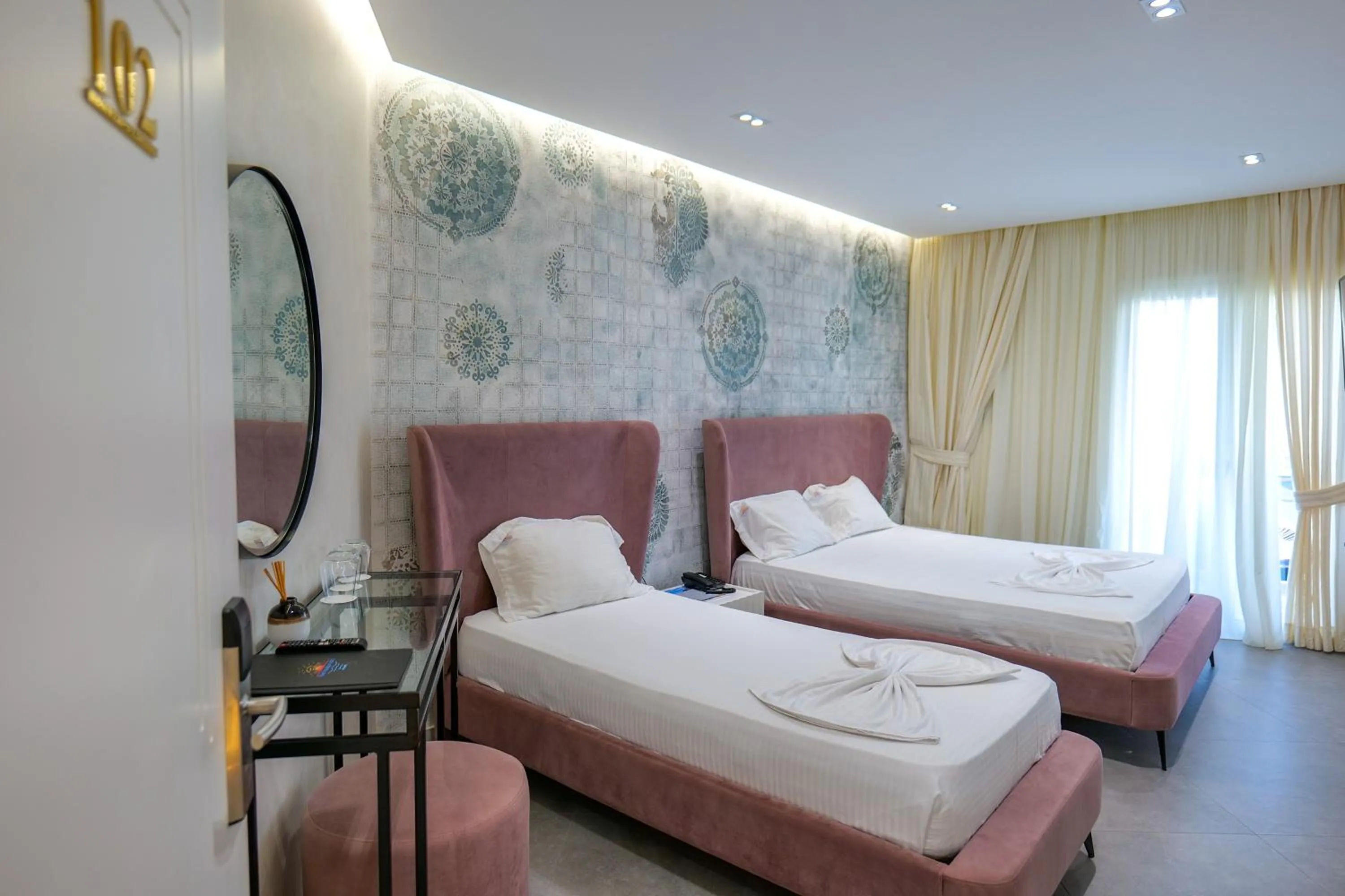 Bed in HH Boutique Hotel