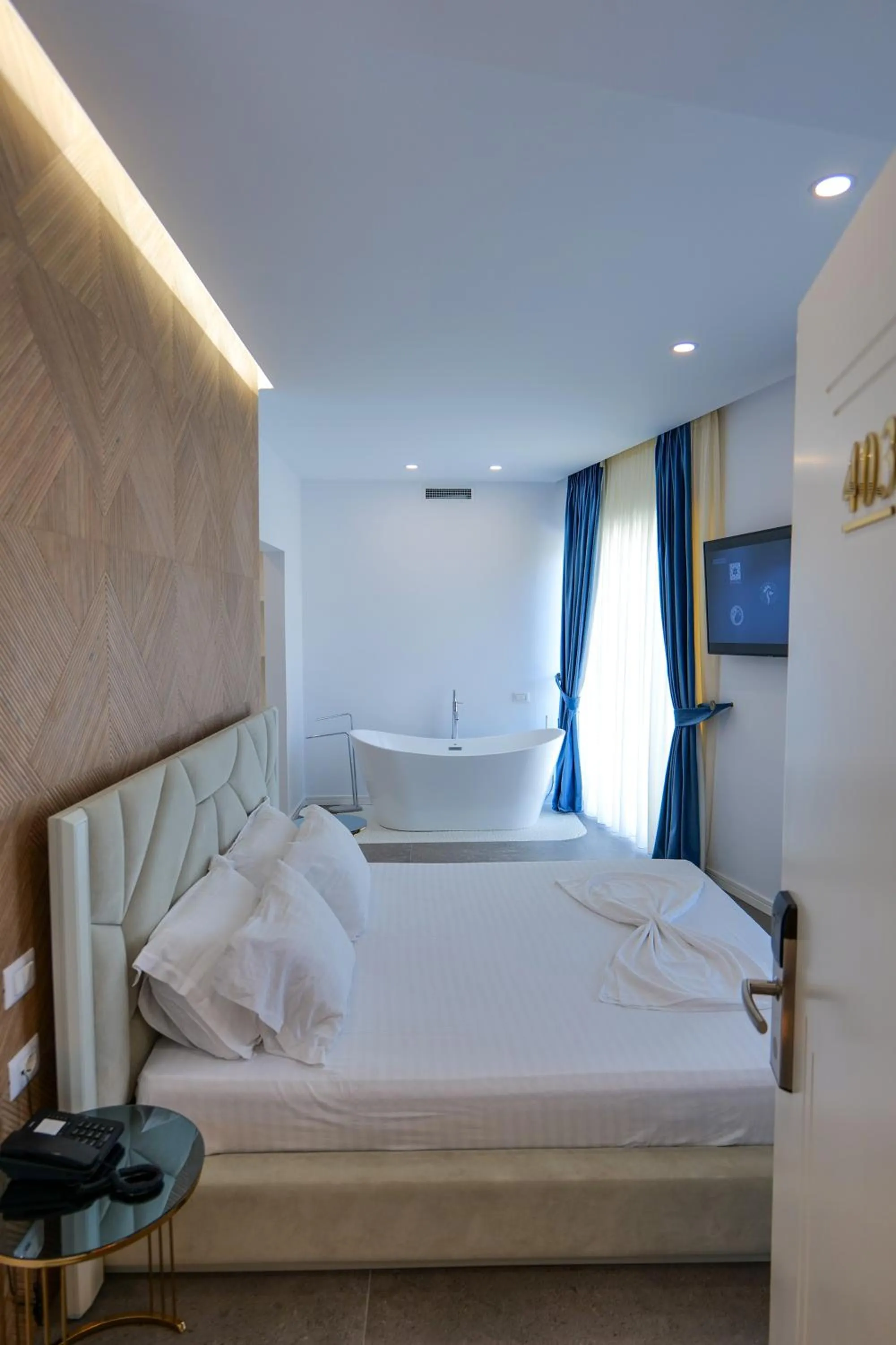 Bed in HH Boutique Hotel