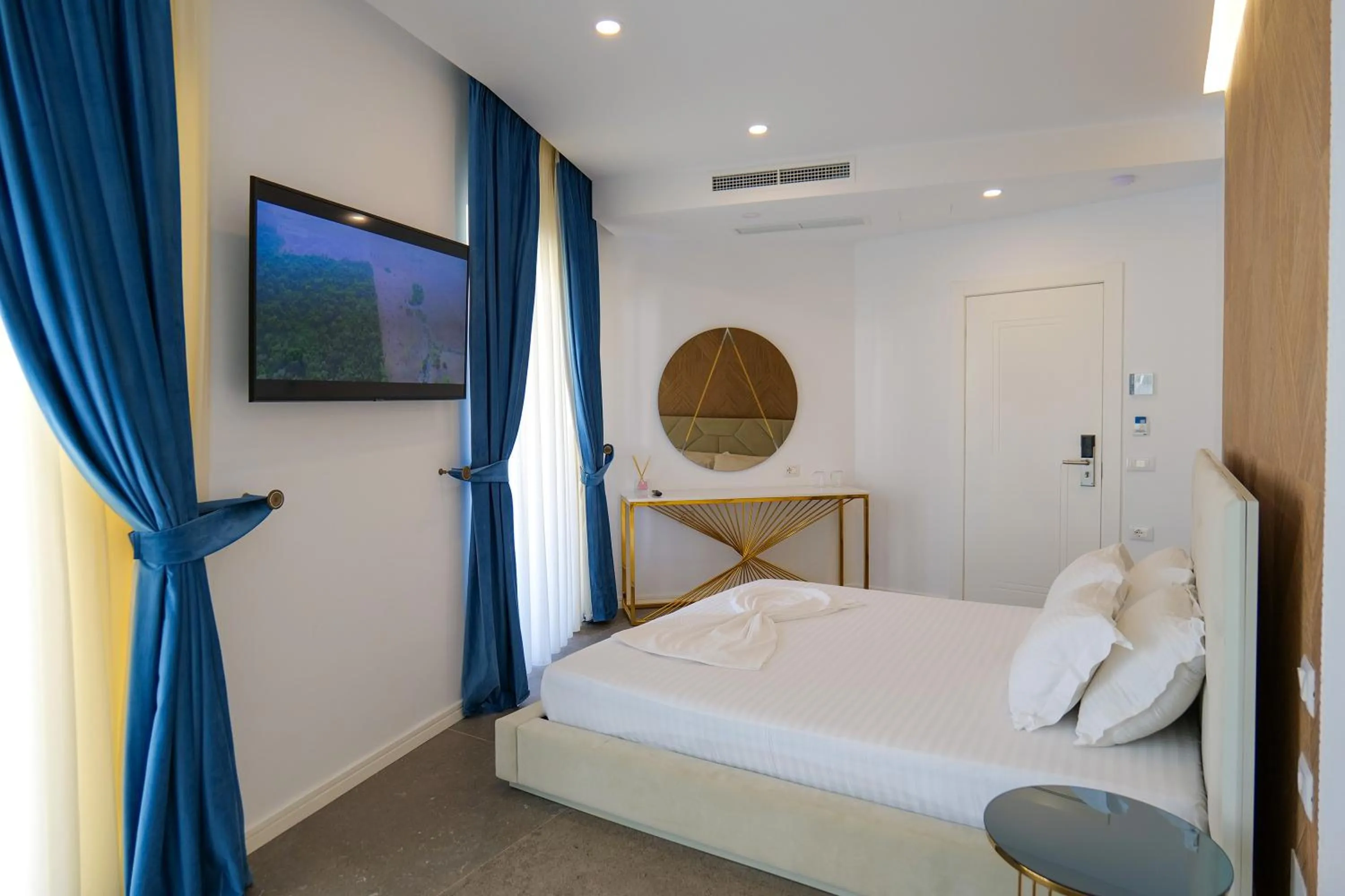 Bed in HH Boutique Hotel