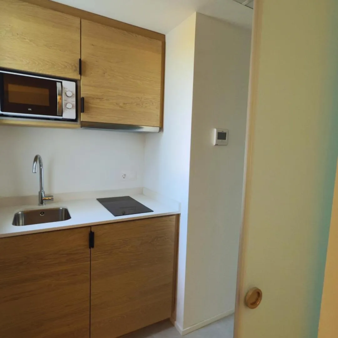 Kitchen or kitchenette in MYO Barcelona Hotel & Apartments