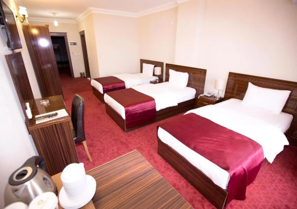 Bed in Resmina Hotel