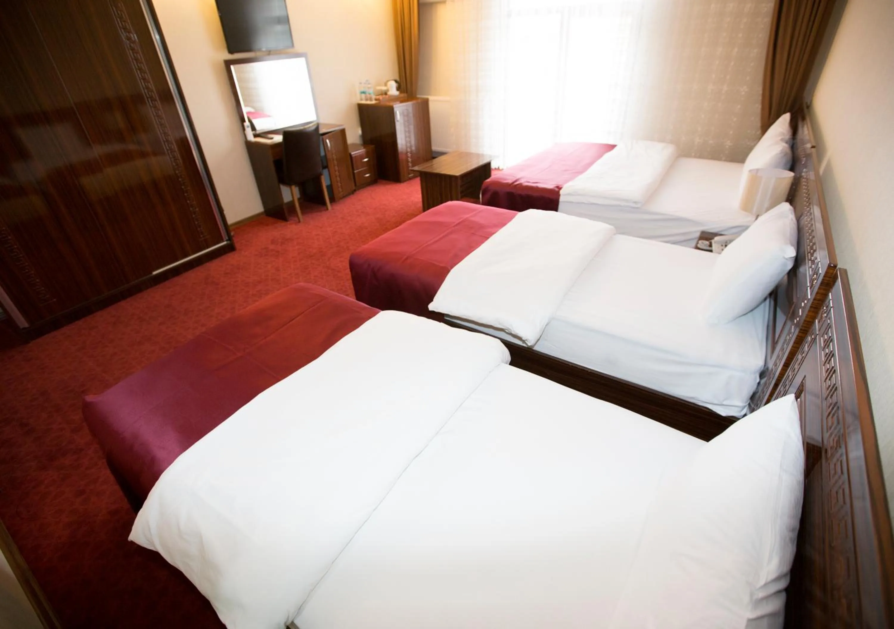 Bed in Resmina Hotel