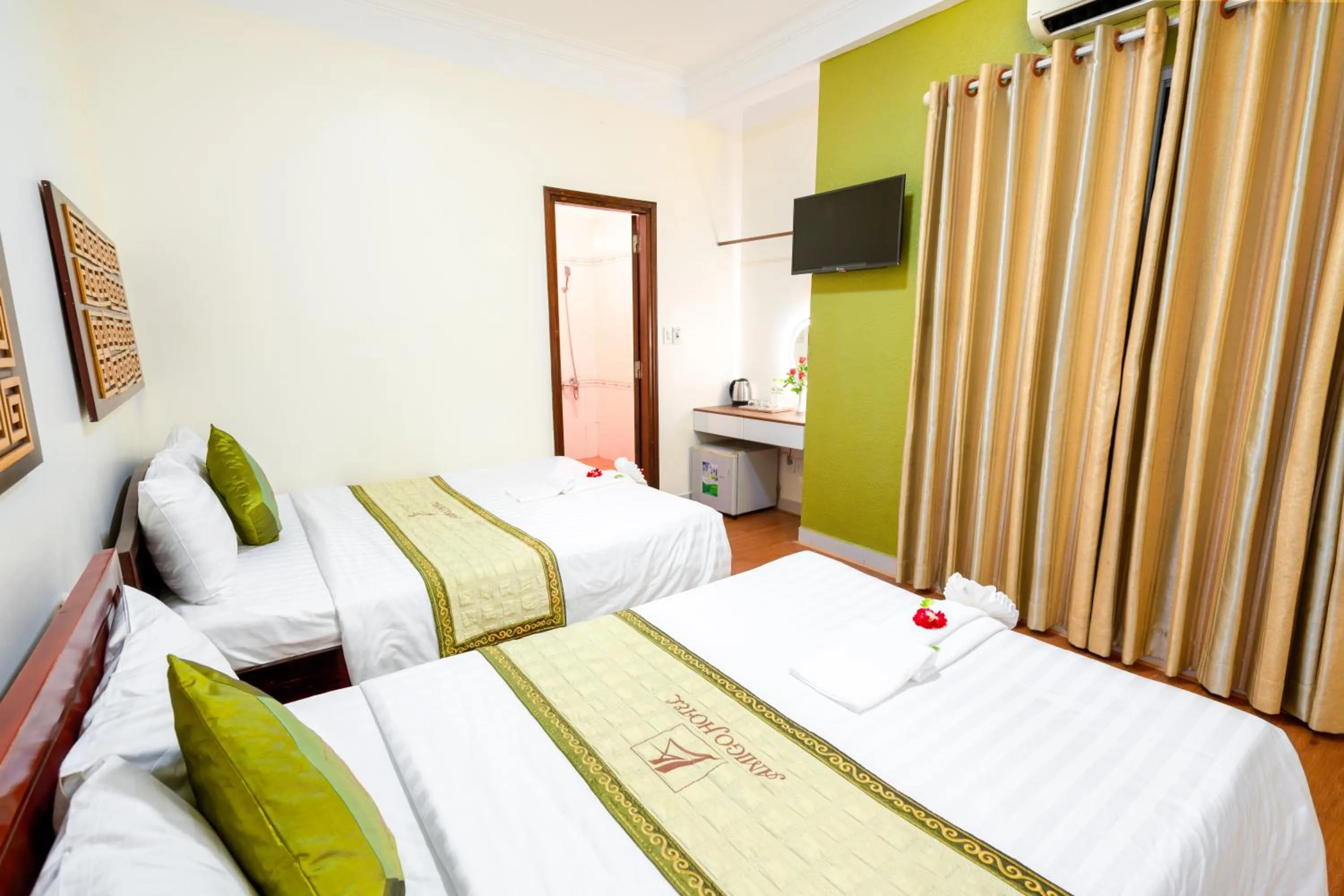 Bed in AMIGO HUE hotel