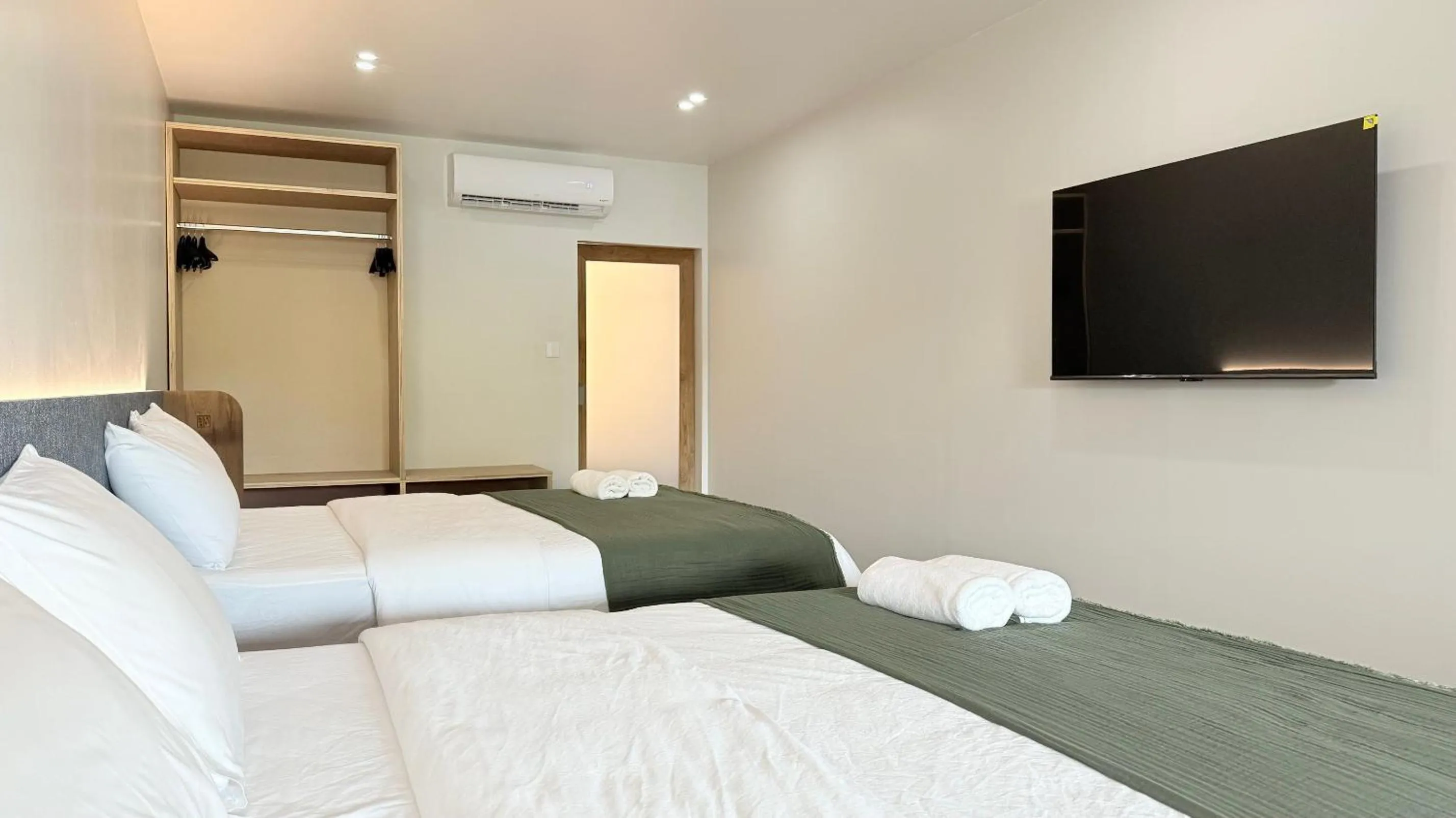 Bed in Issara House Bangkok