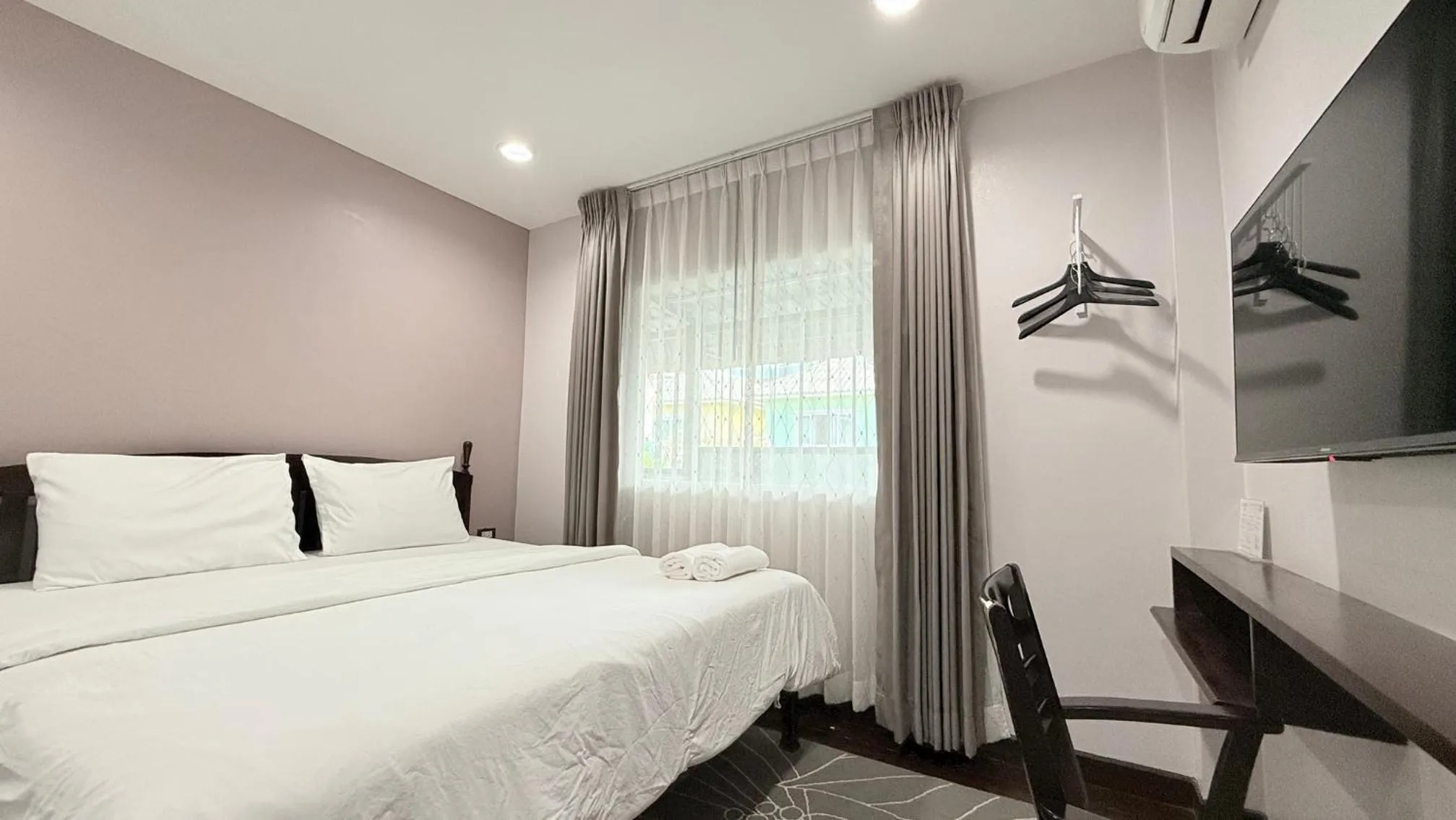 Bed in Issara House Bangkok