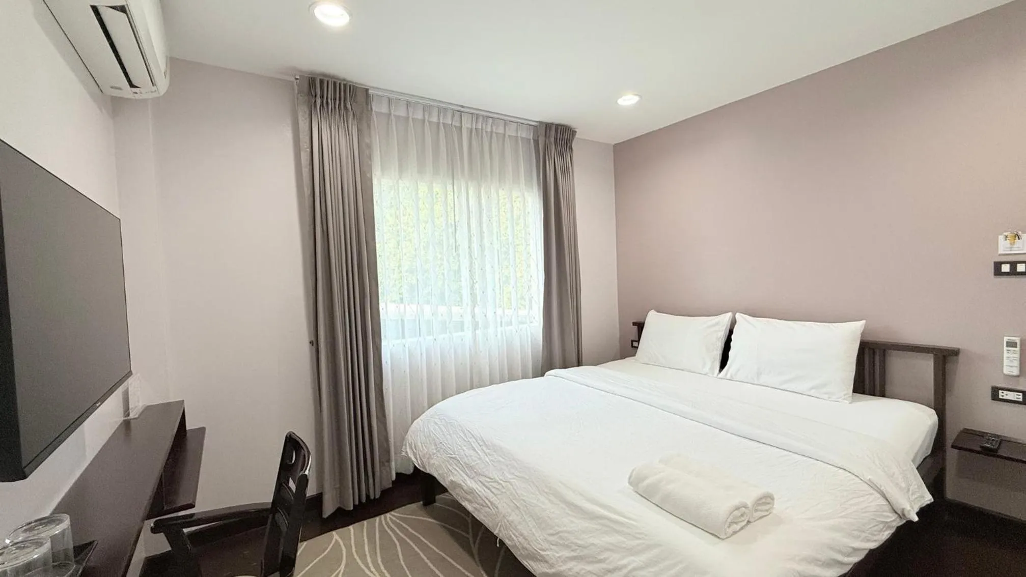 Bed in Issara House Bangkok