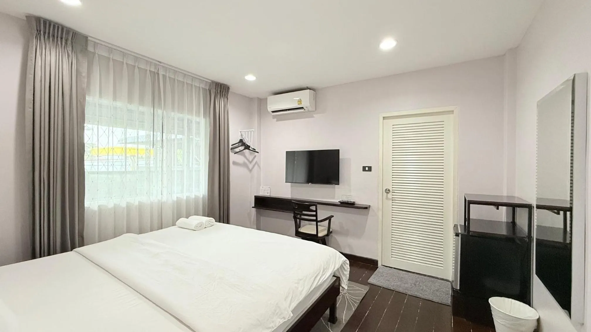 Bed in Issara House Bangkok