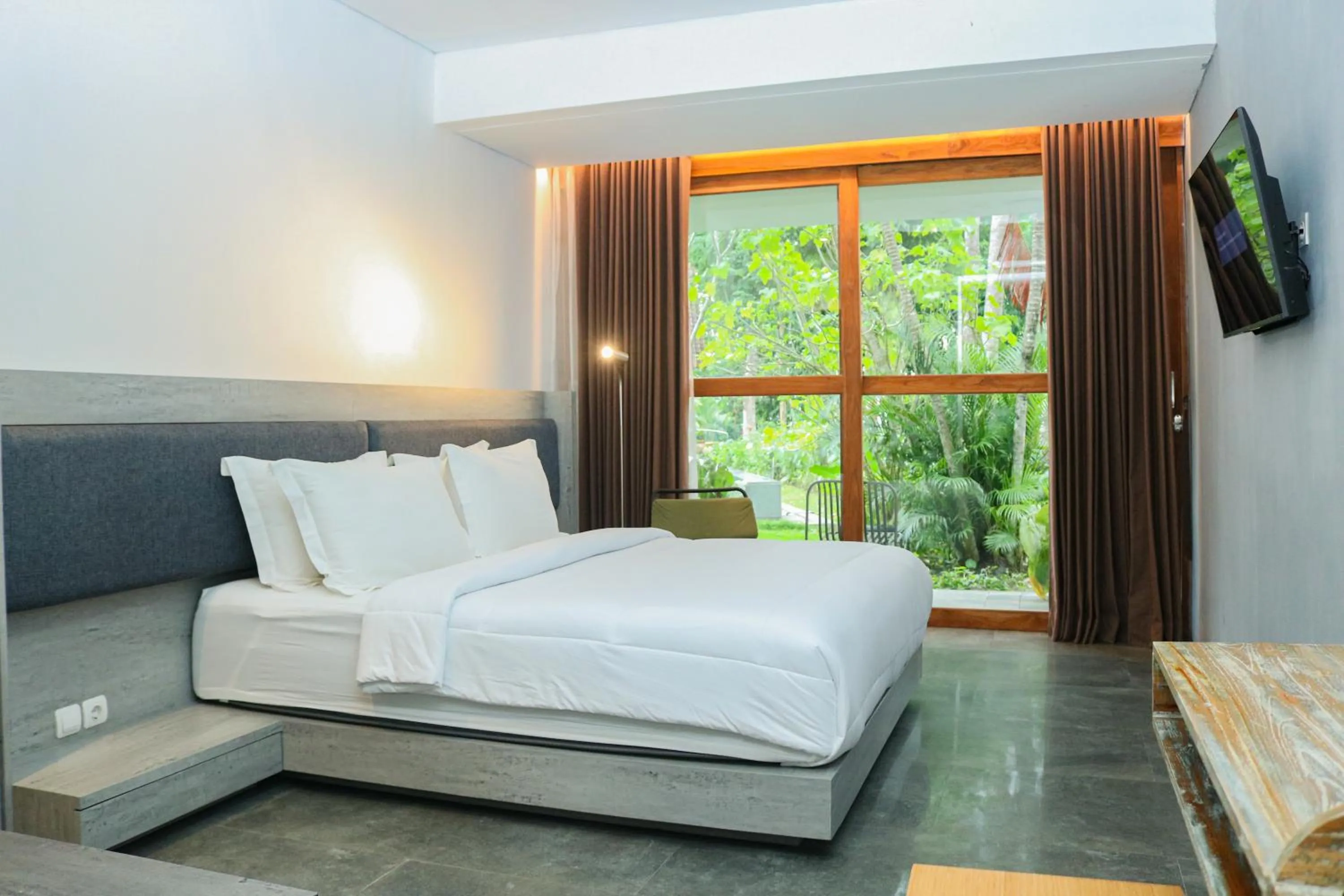 Bed in The Setumbu Experience, ARTOTEL Curated