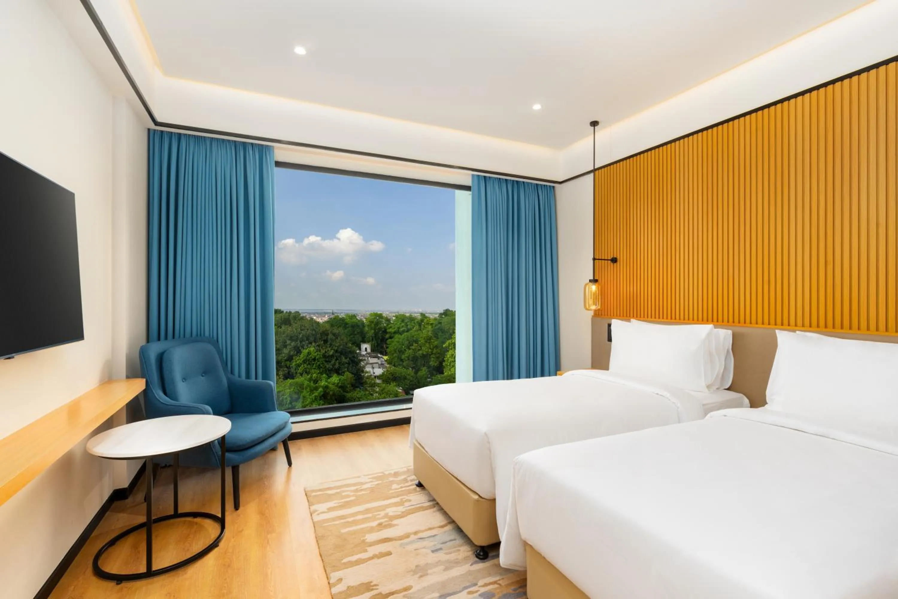 Bedroom, Bed in Radisson Hotel Prayagraj