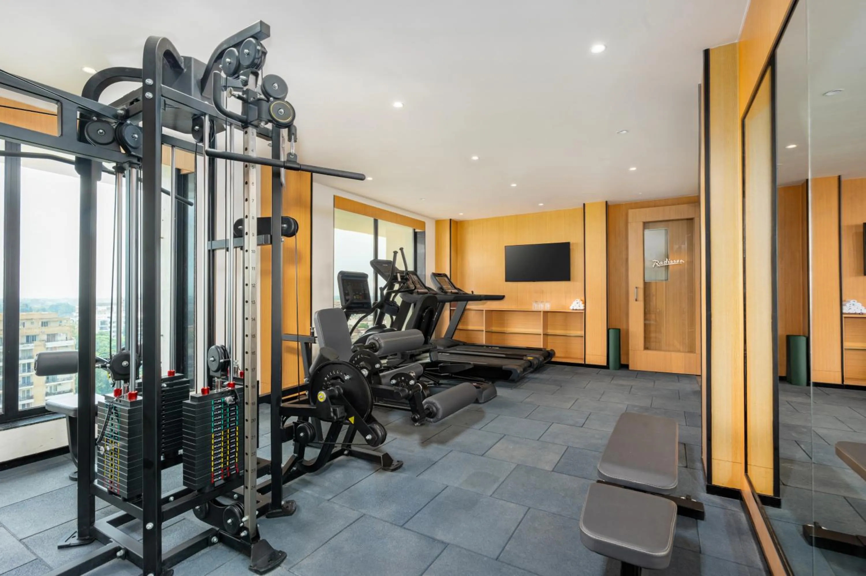 Fitness centre/facilities in Radisson Hotel Prayagraj
