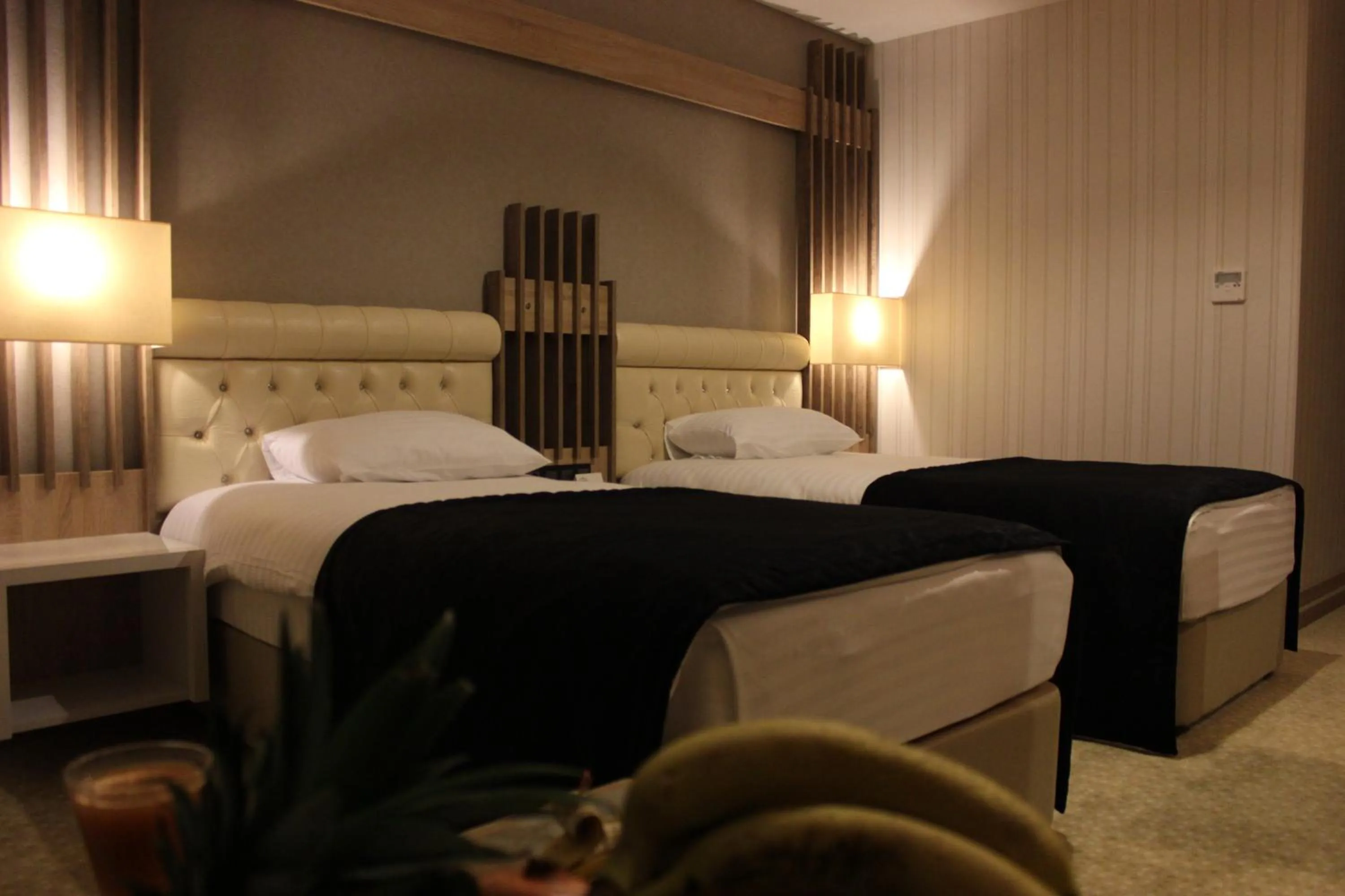 Bed in Neba Royal Hotel