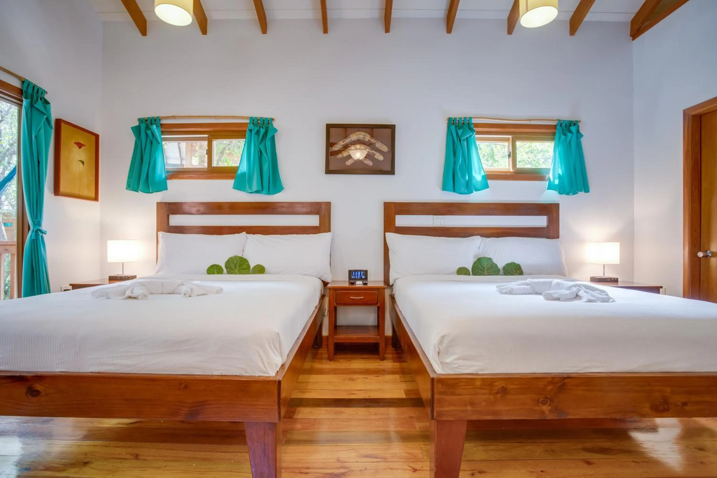 Bed in Mariposa Belize Beach Resort