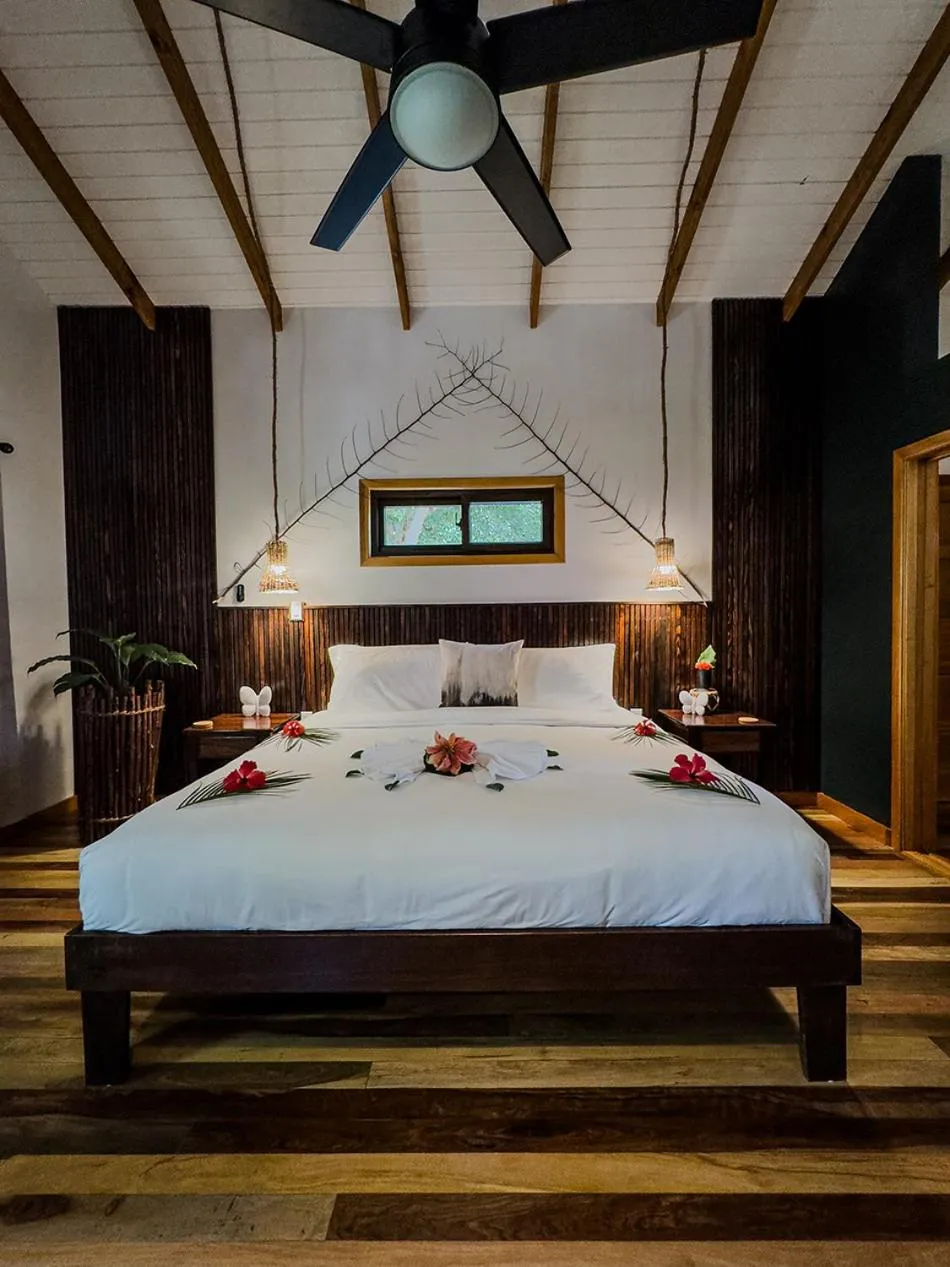 Bed in Mariposa Belize Beach Resort