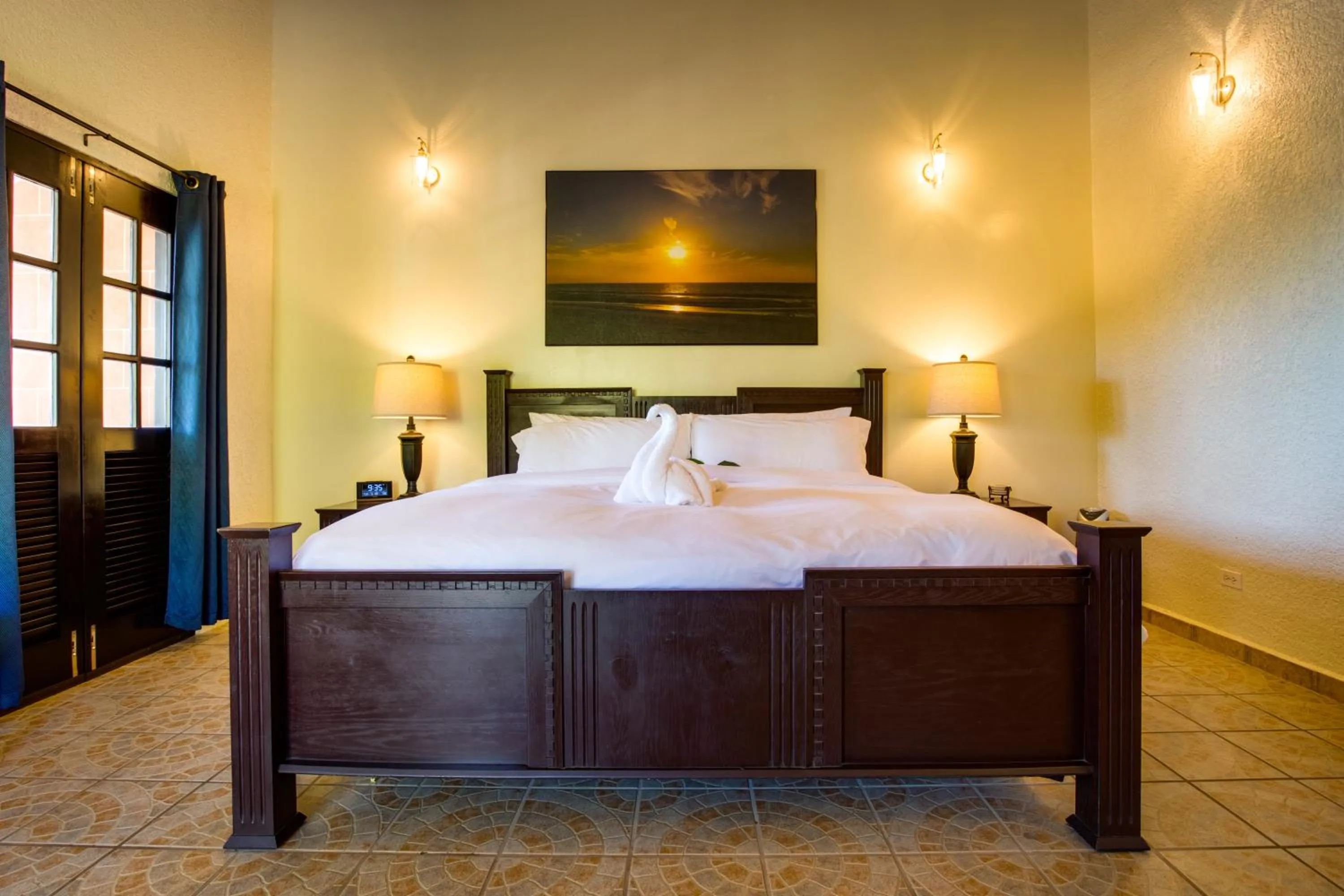 Bed in Mariposa Belize Beach Resort