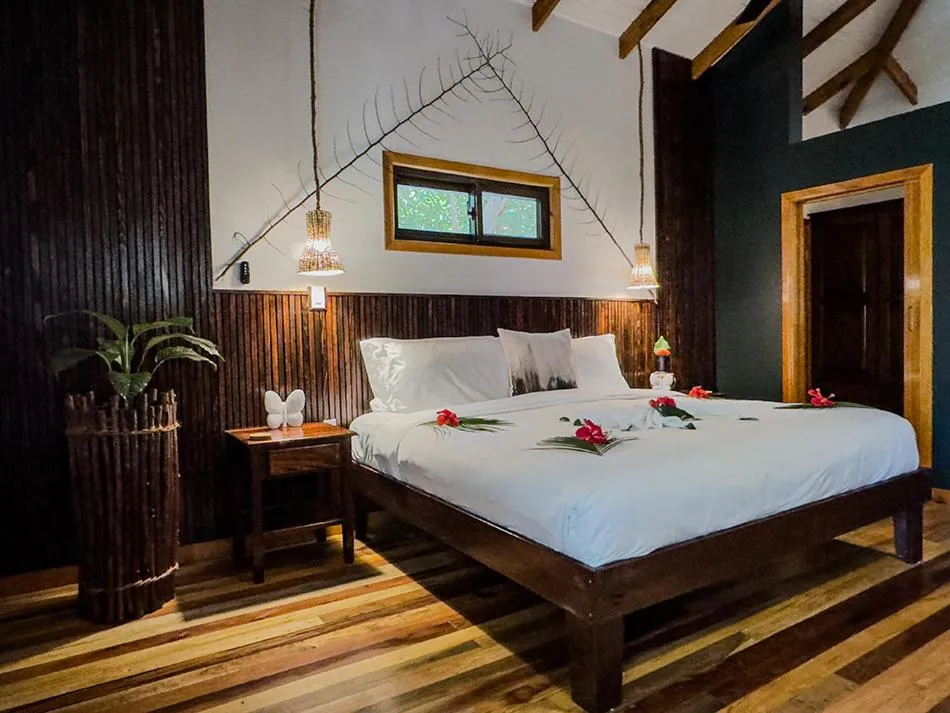 Bed in Mariposa Belize Beach Resort