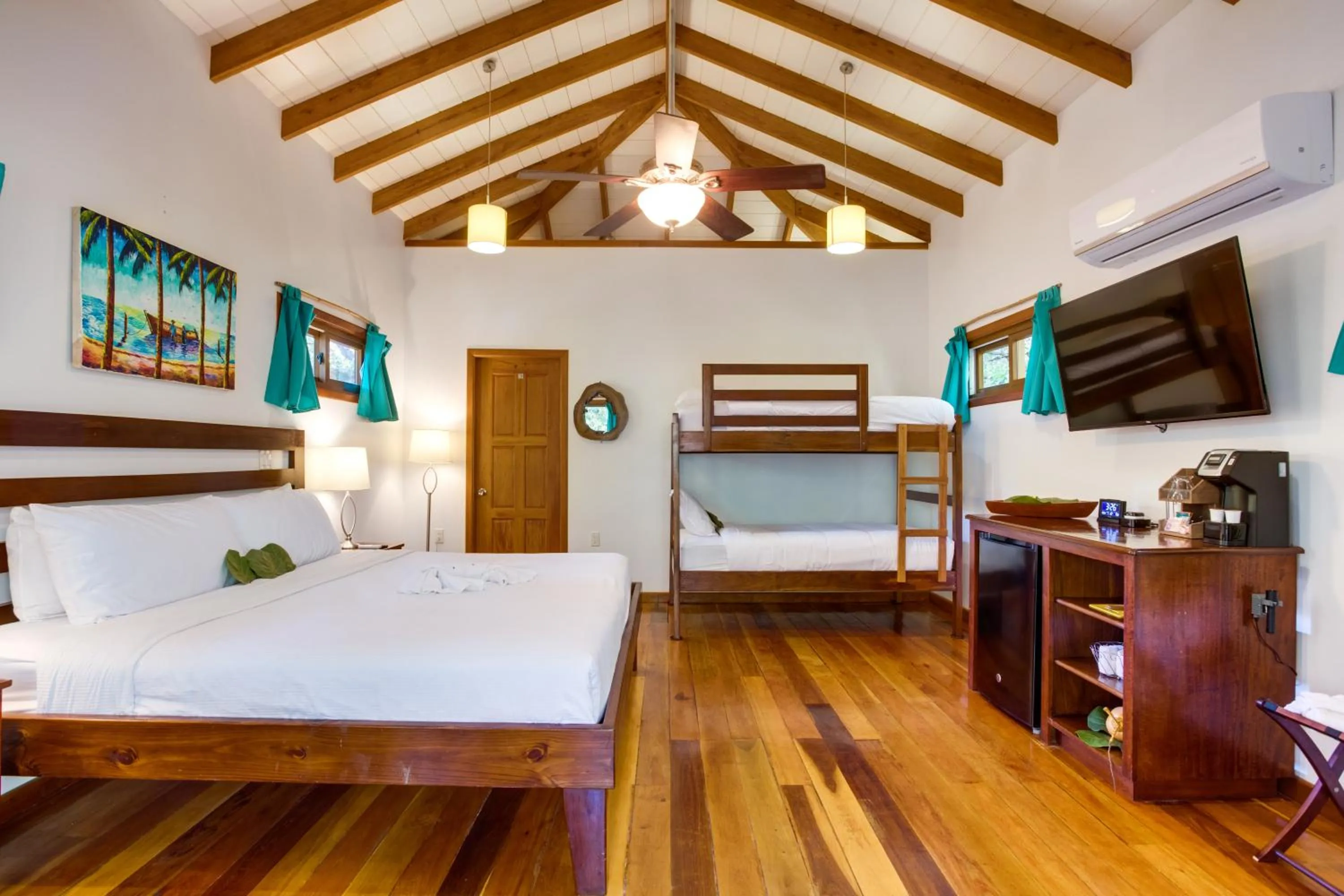 Bed in Mariposa Belize Beach Resort