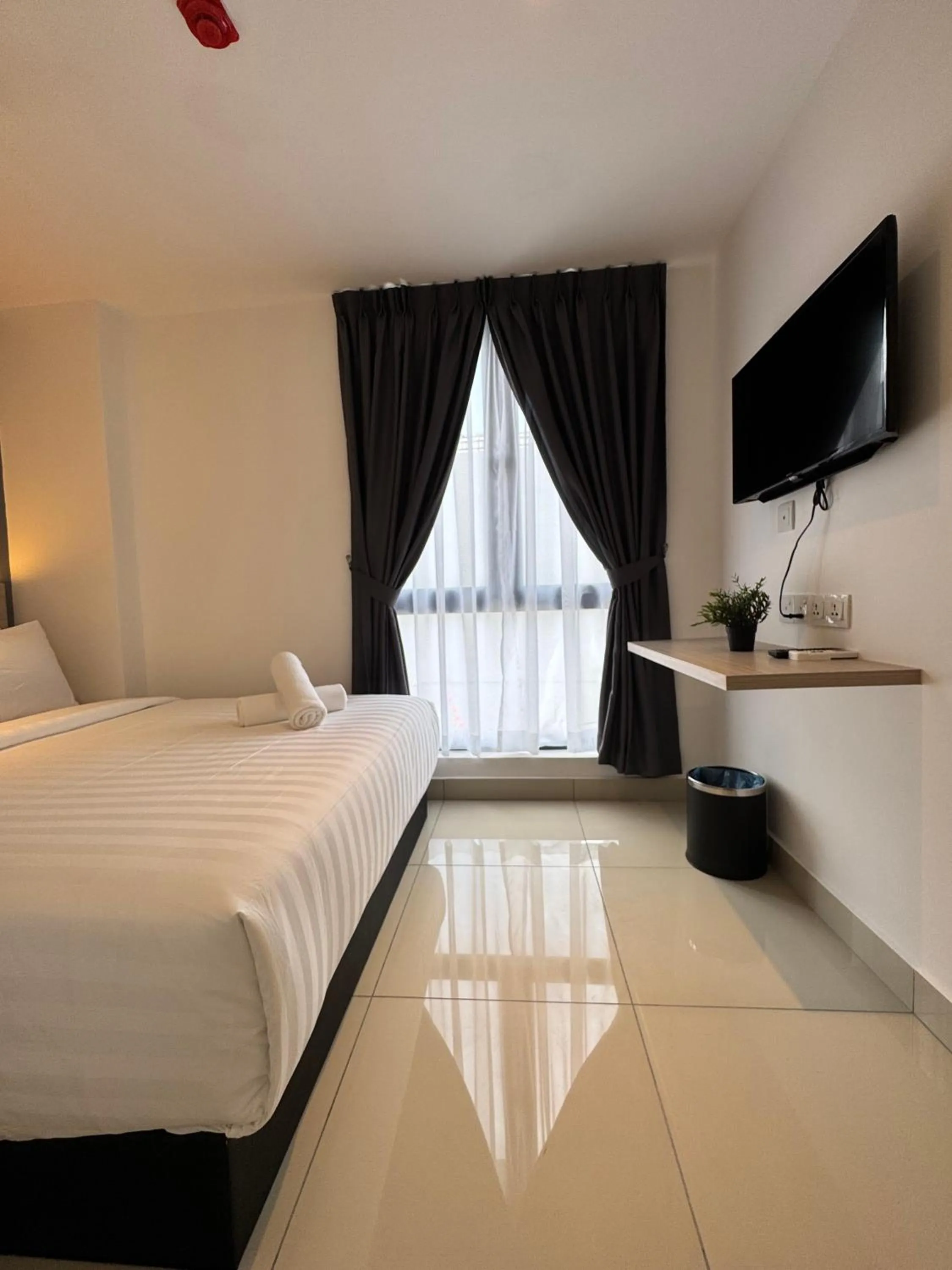 Bed in Maca Hotel by Sky Hive