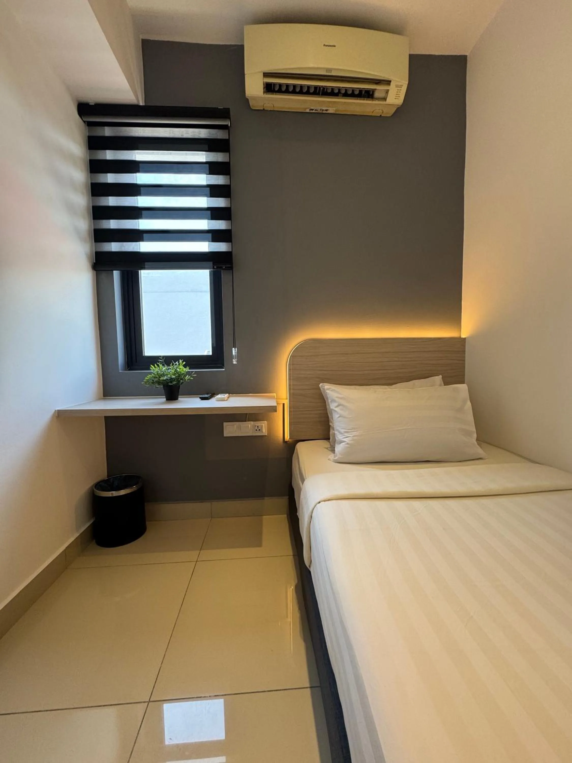 Bed in Maca Hotel by Sky Hive