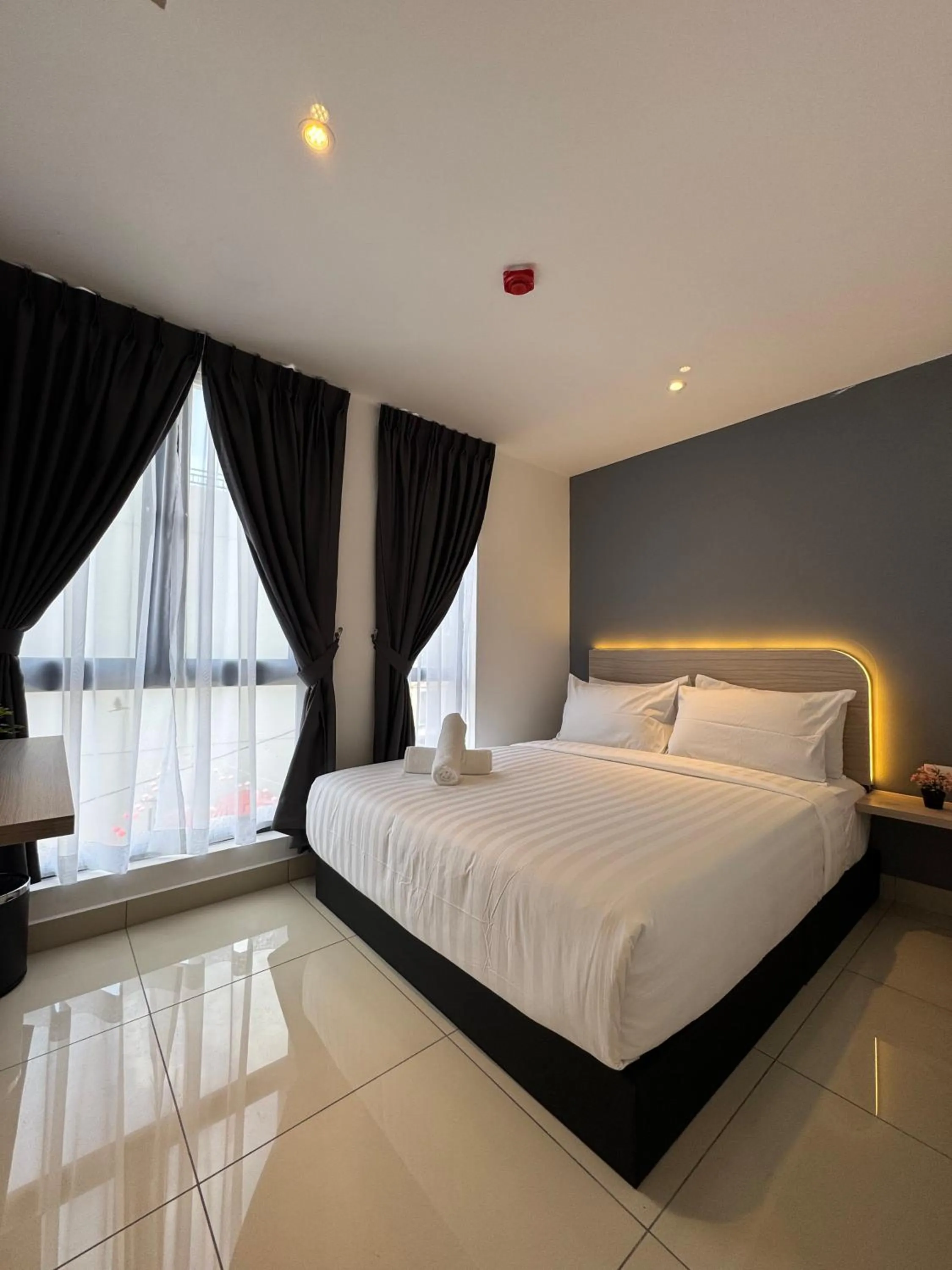 Bed in Maca Hotel by Sky Hive