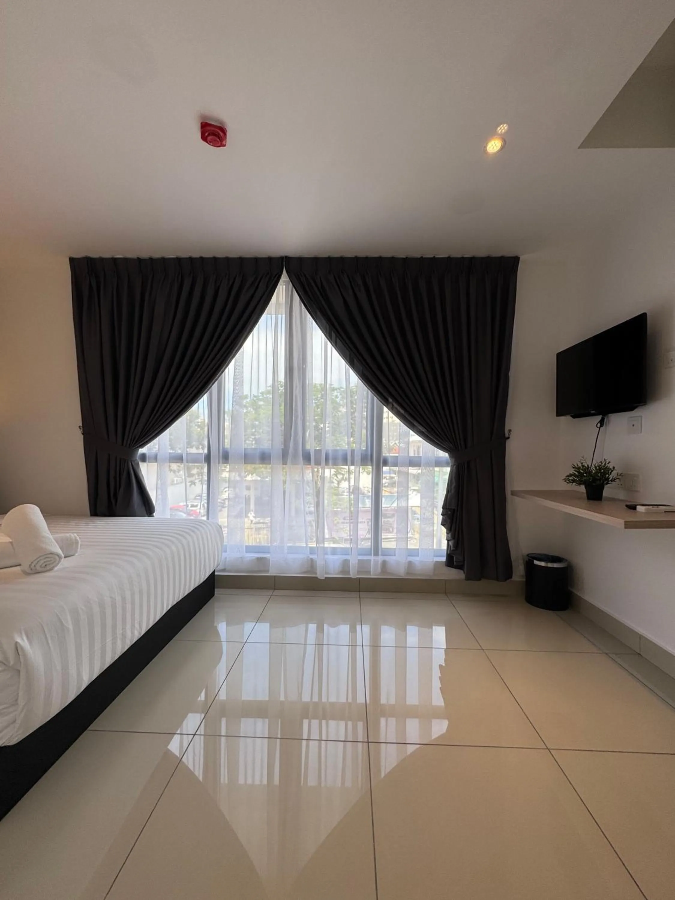 Bed in Maca Hotel by Sky Hive