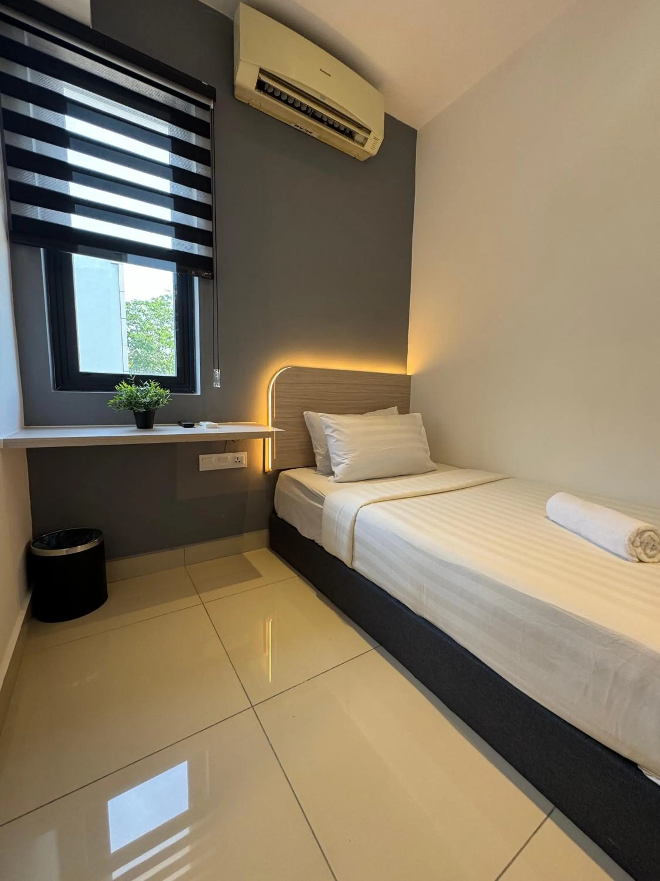 Bed in Maca Hotel by Sky Hive