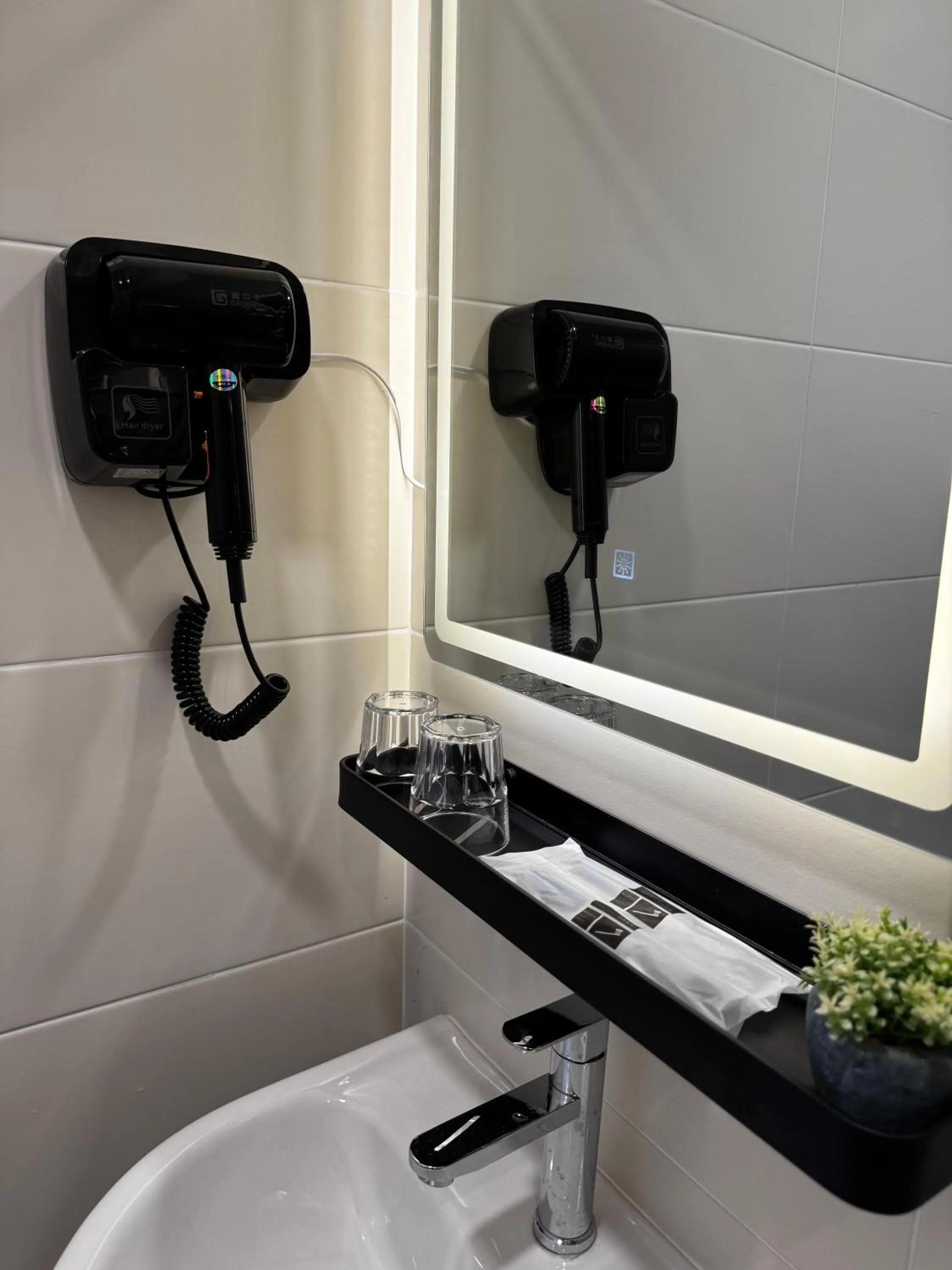 Bathroom in Maca Hotel by Sky Hive