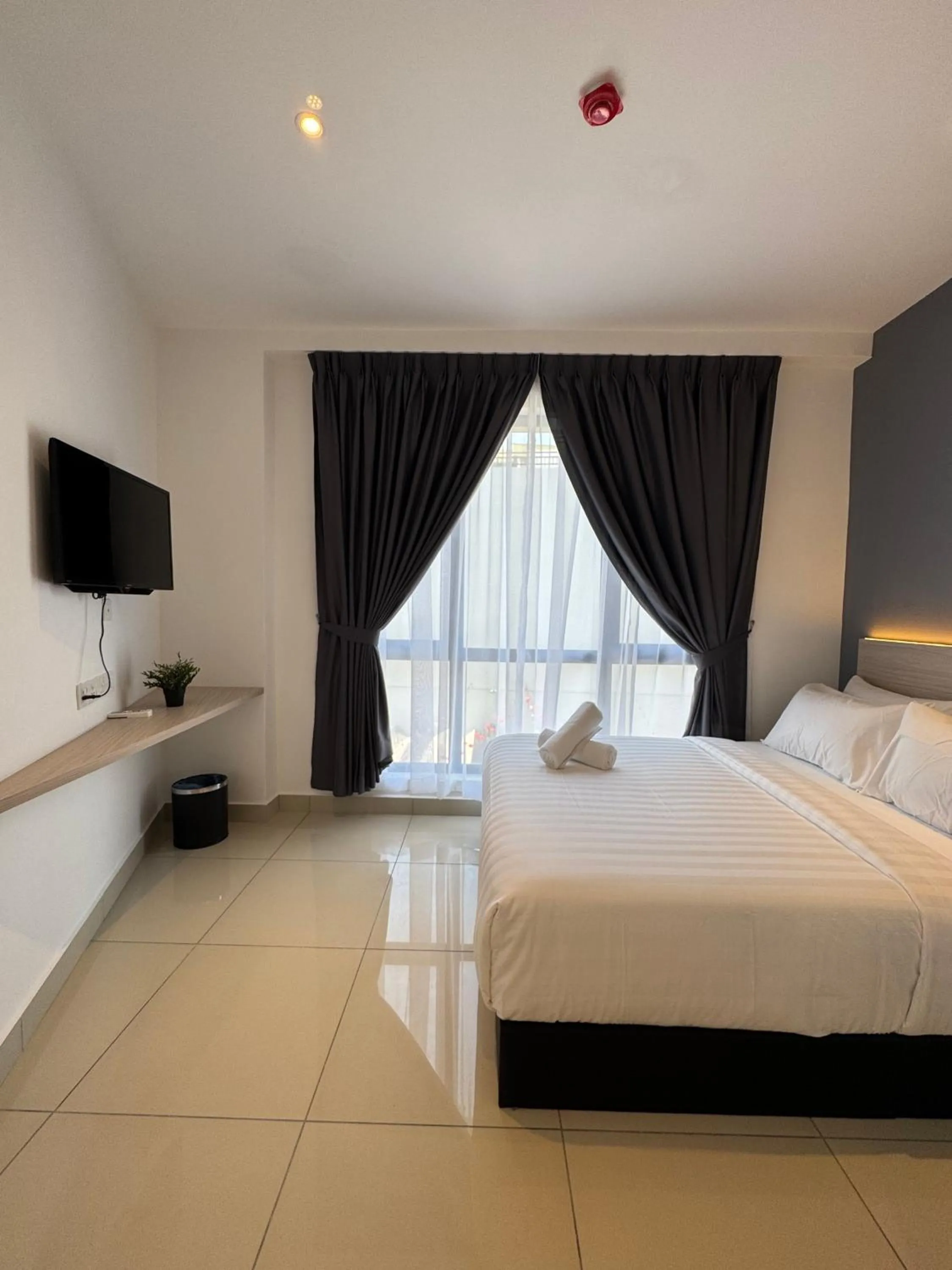 Bed in Maca Hotel by Sky Hive