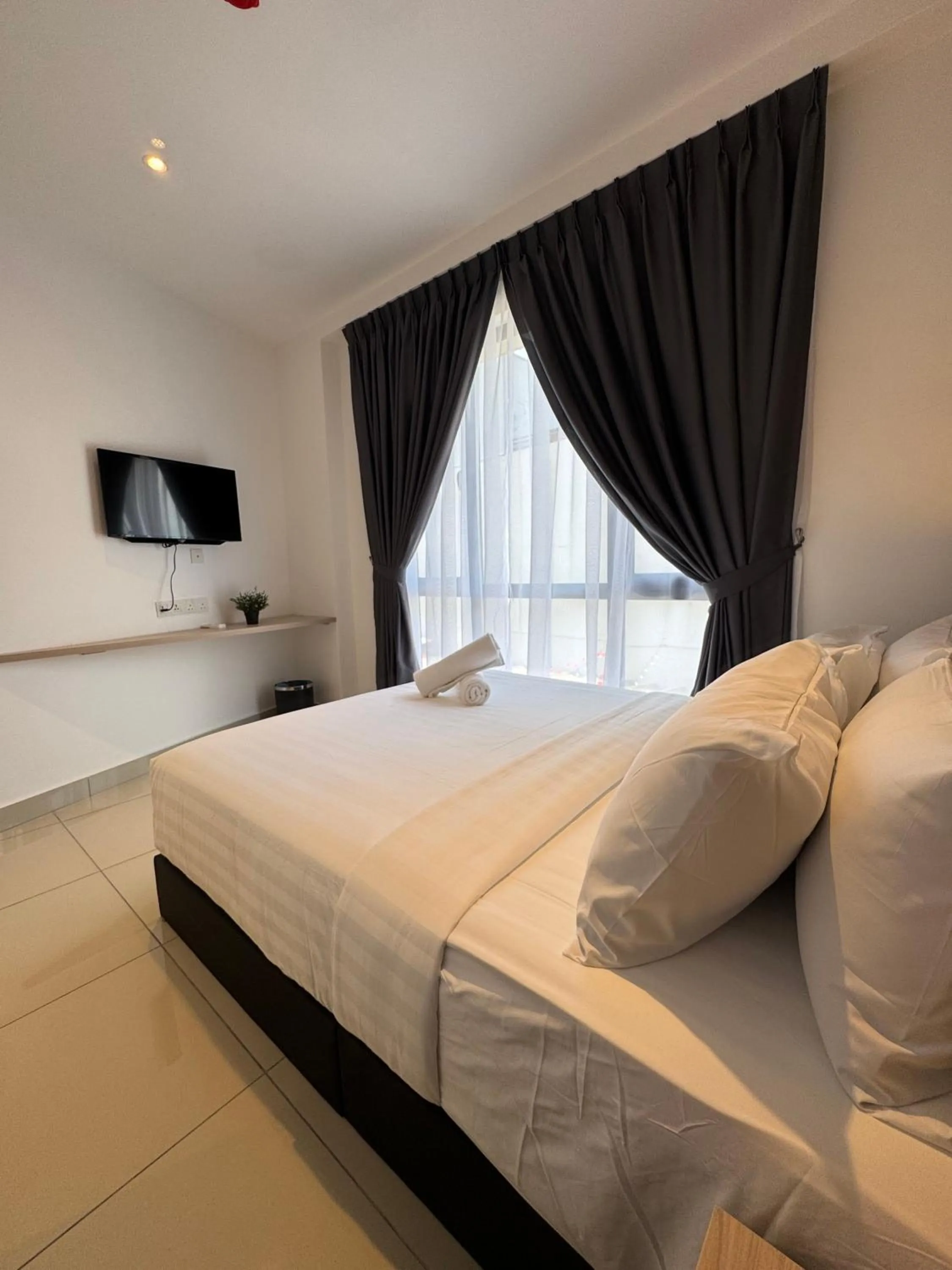 Bed in Maca Hotel by Sky Hive