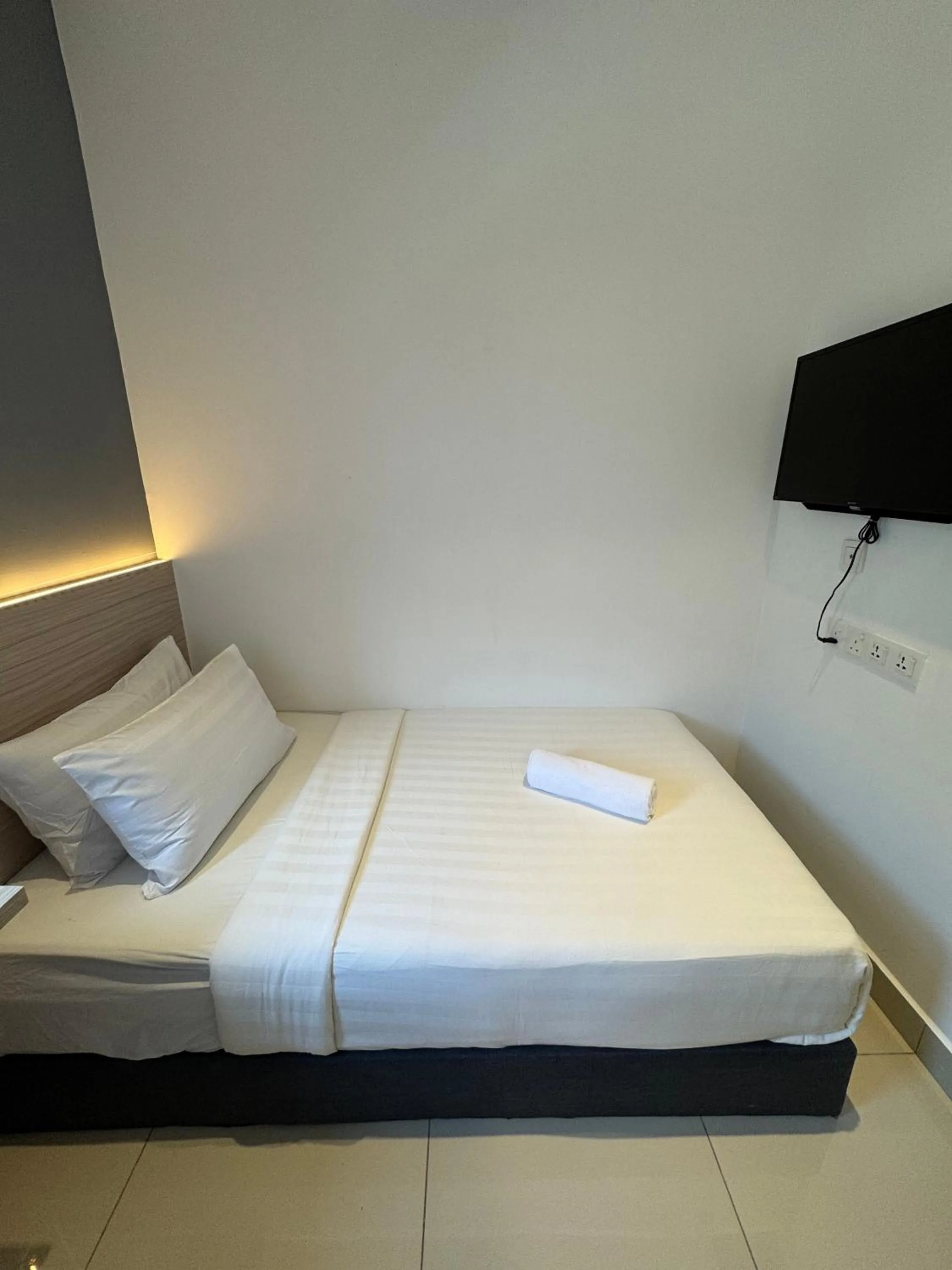 Bed in Maca Hotel by Sky Hive