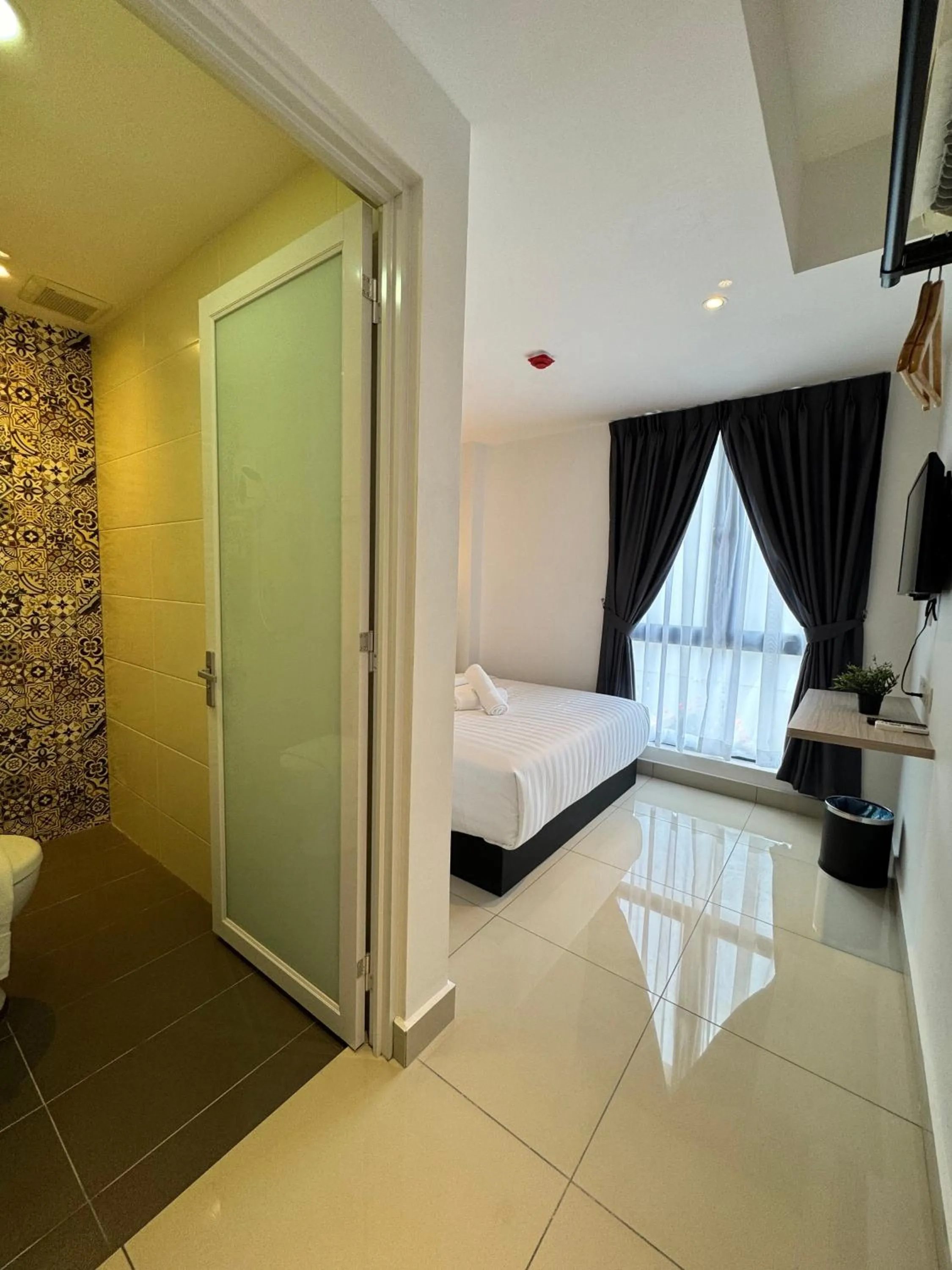 Bed in Maca Hotel by Sky Hive