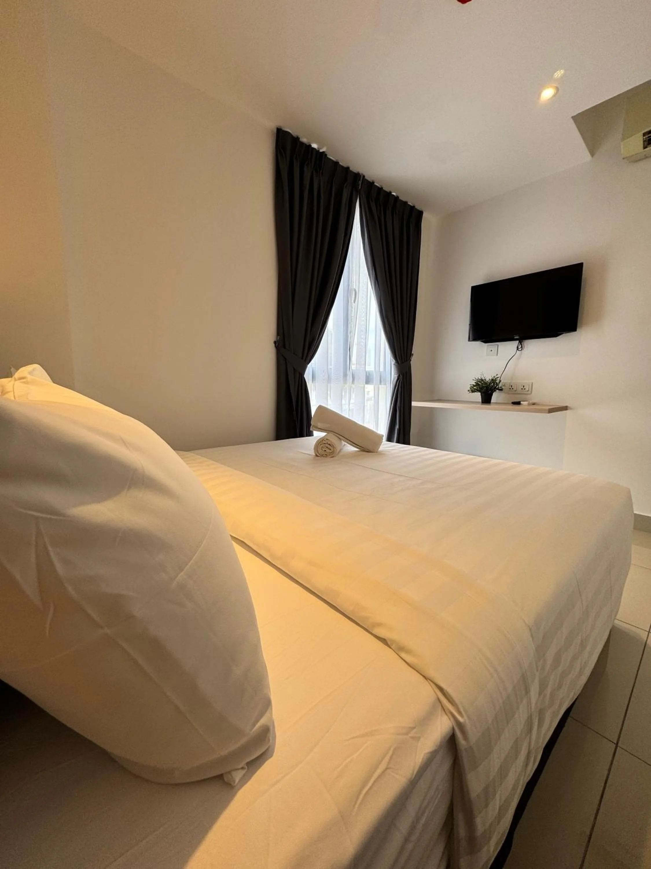 Bed in Maca Hotel by Sky Hive