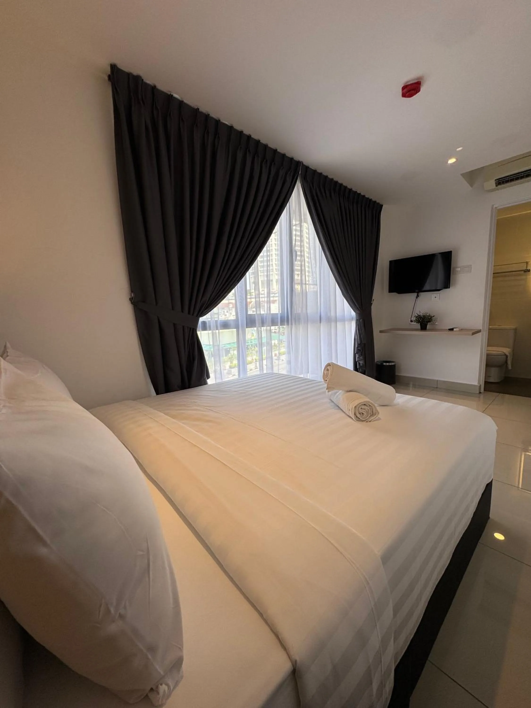 Bed in Maca Hotel by Sky Hive