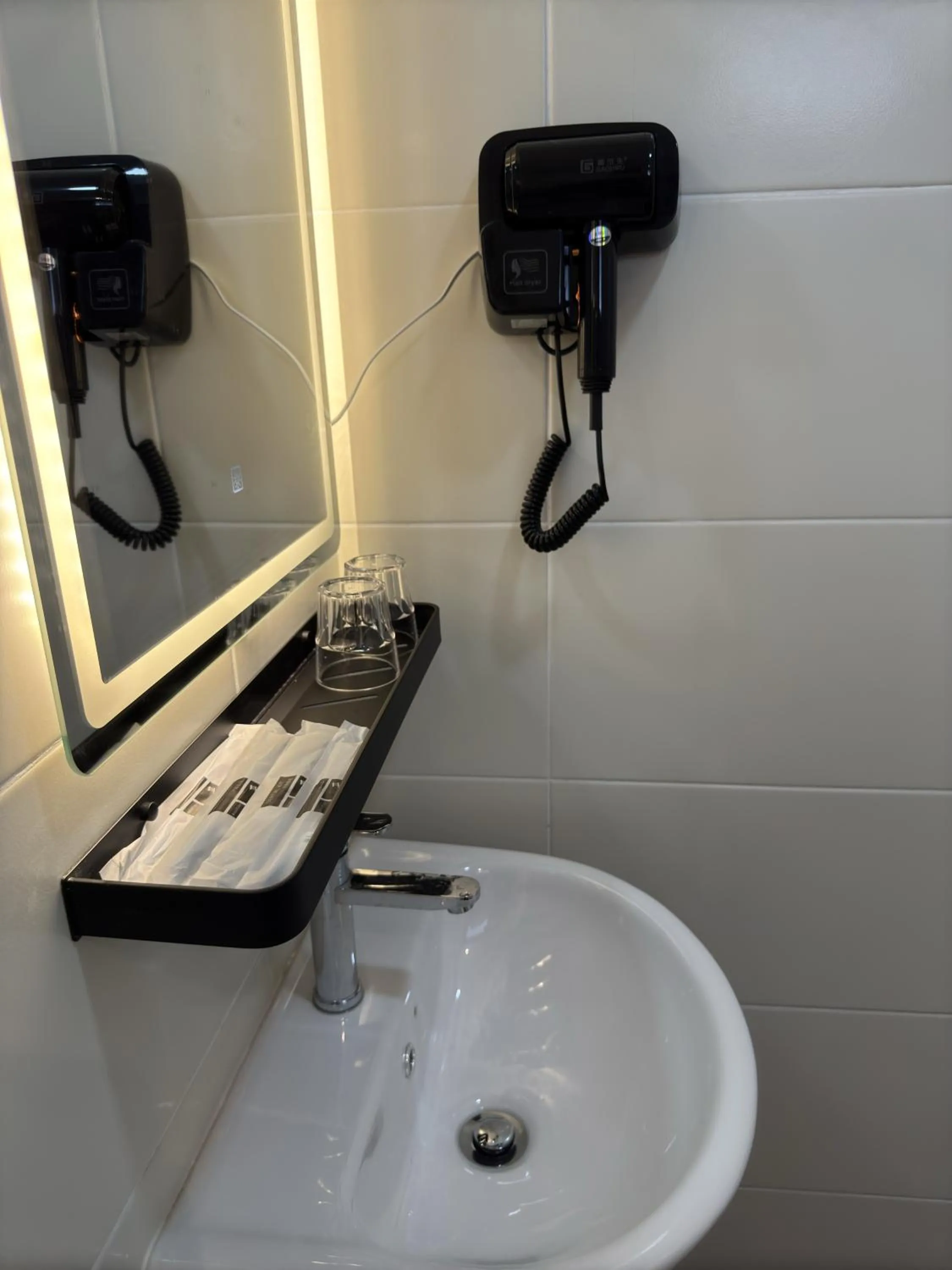 Bathroom in Maca Hotel by Sky Hive