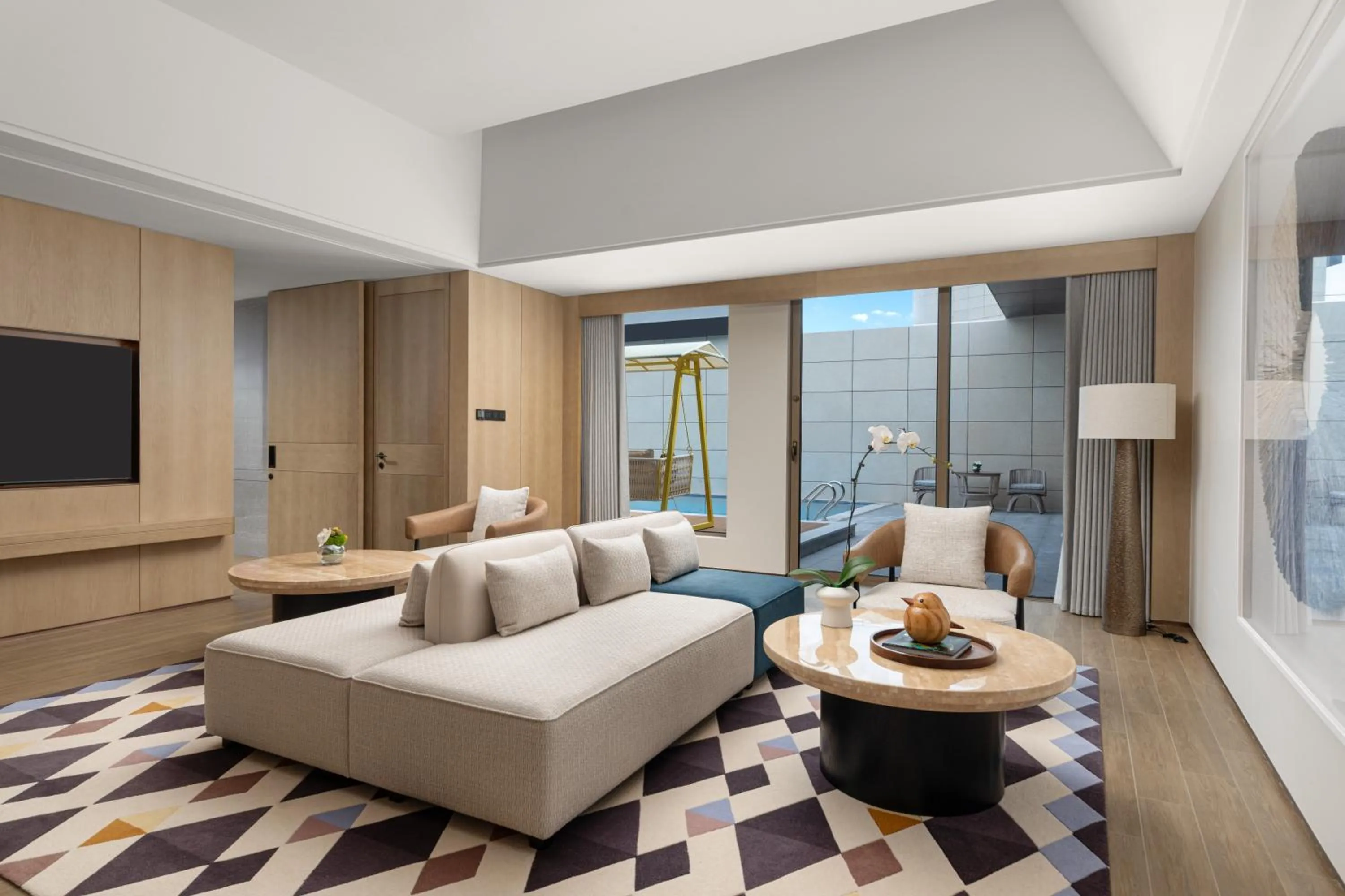 Living room in voco Sanya Dadonghai by IHG