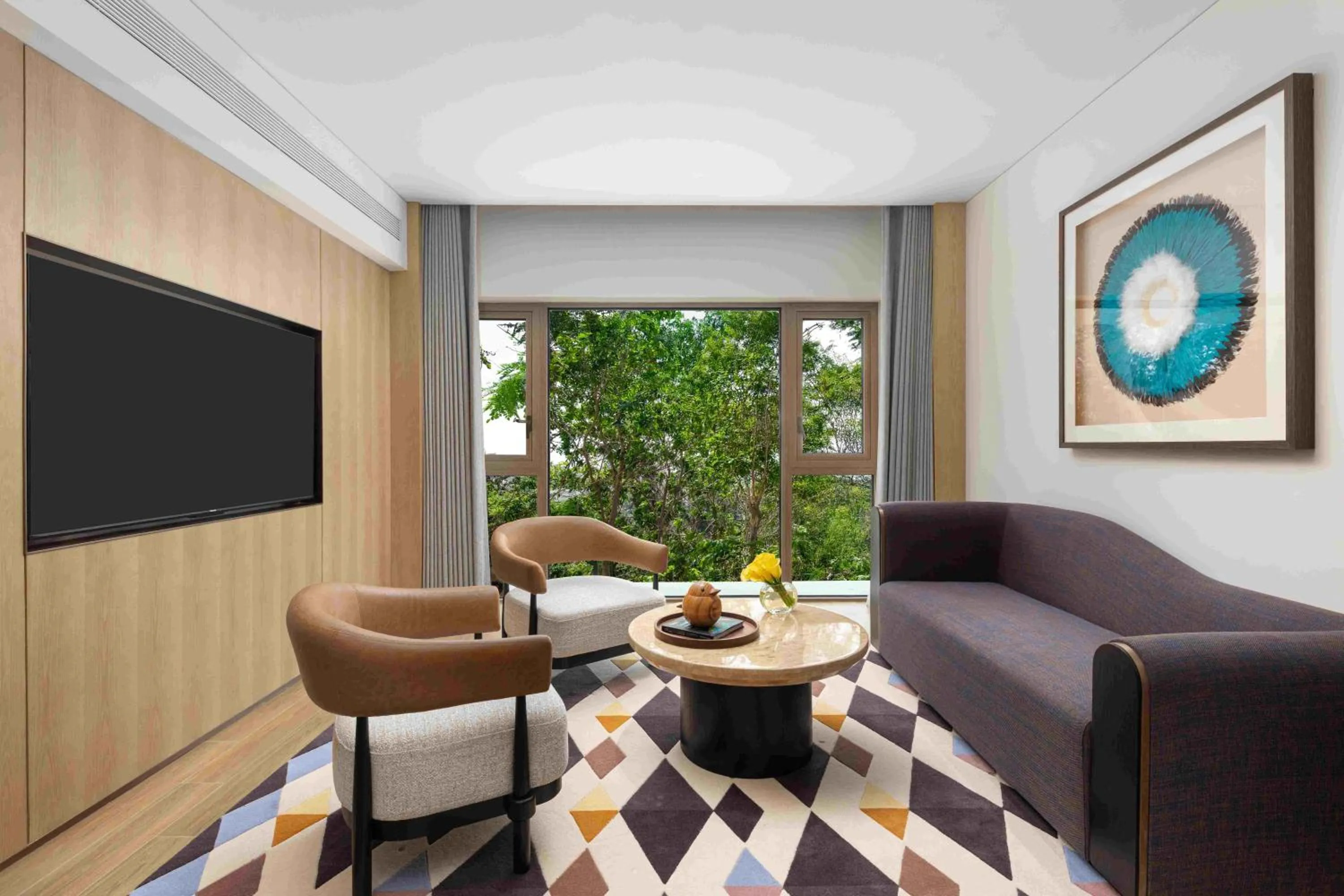 Living room in voco Sanya Dadonghai by IHG