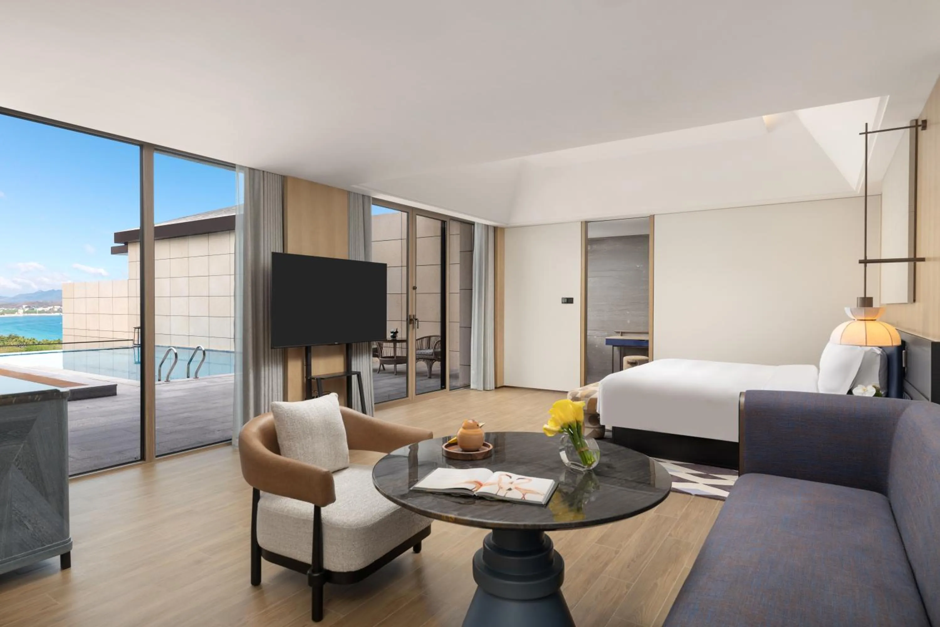 Living room, Bed in voco Sanya Dadonghai by IHG