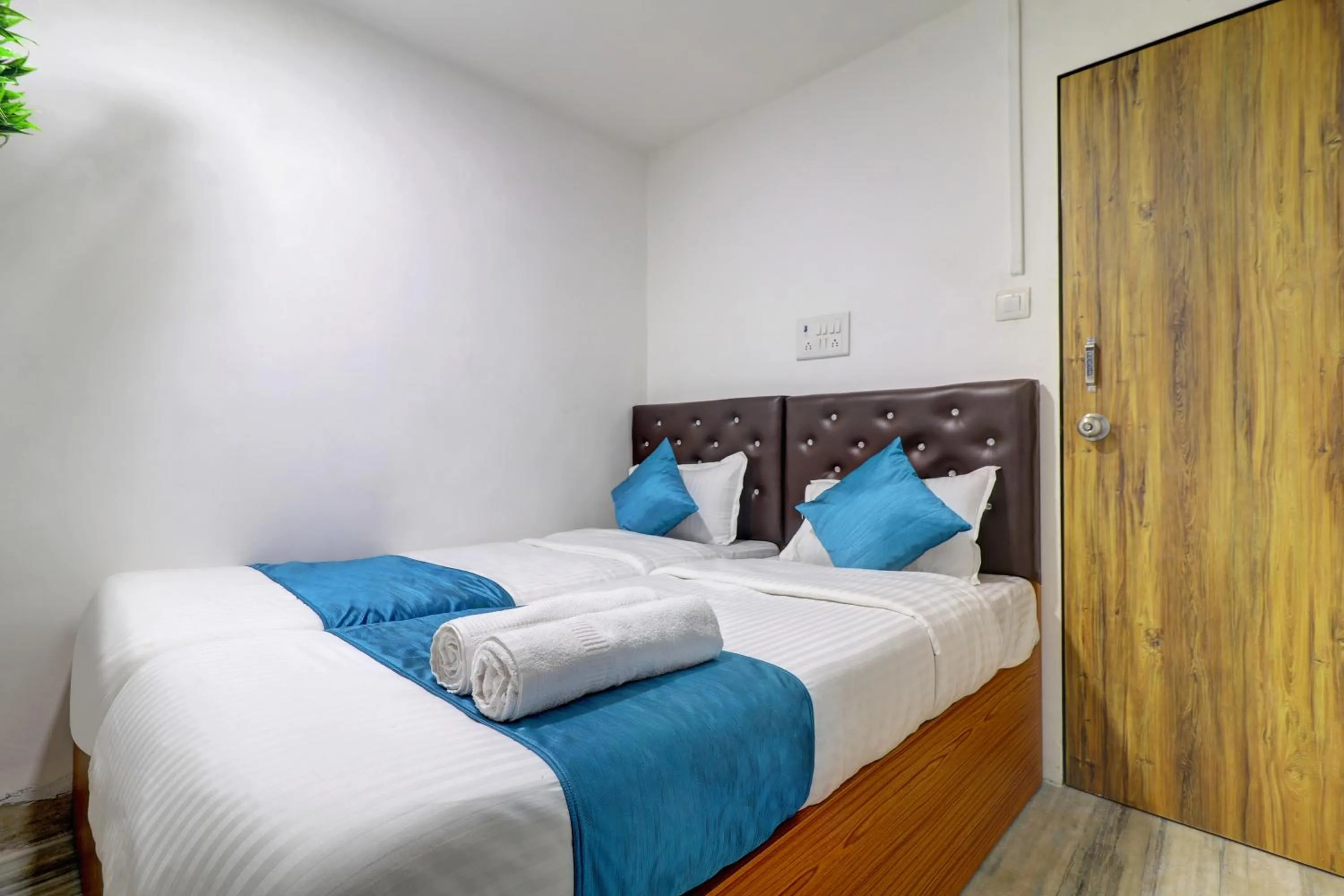 Bed in Raksha Residency