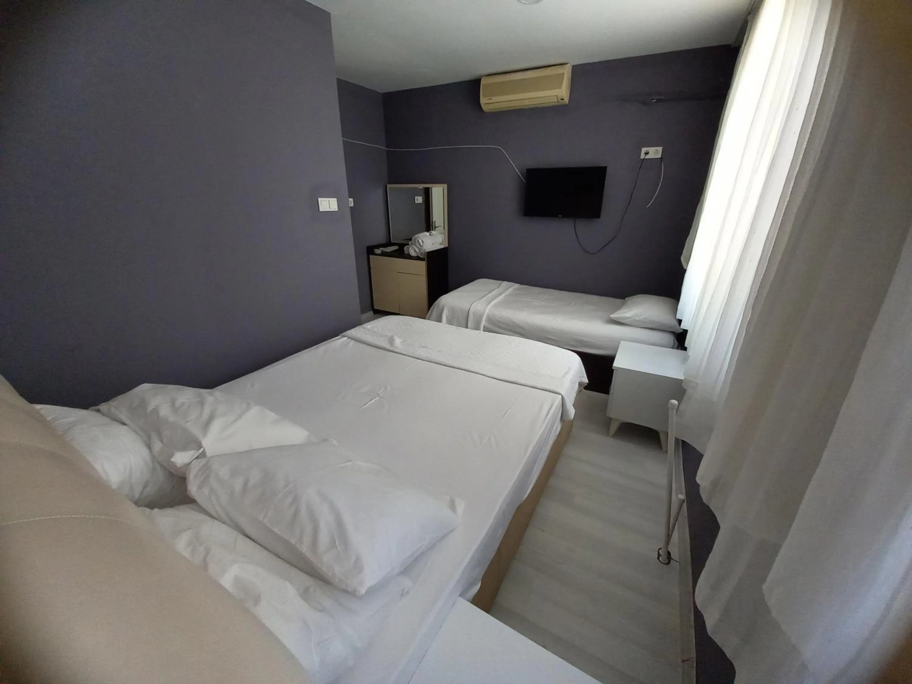 Photo of the whole room, Bed in Dilmac Hotel