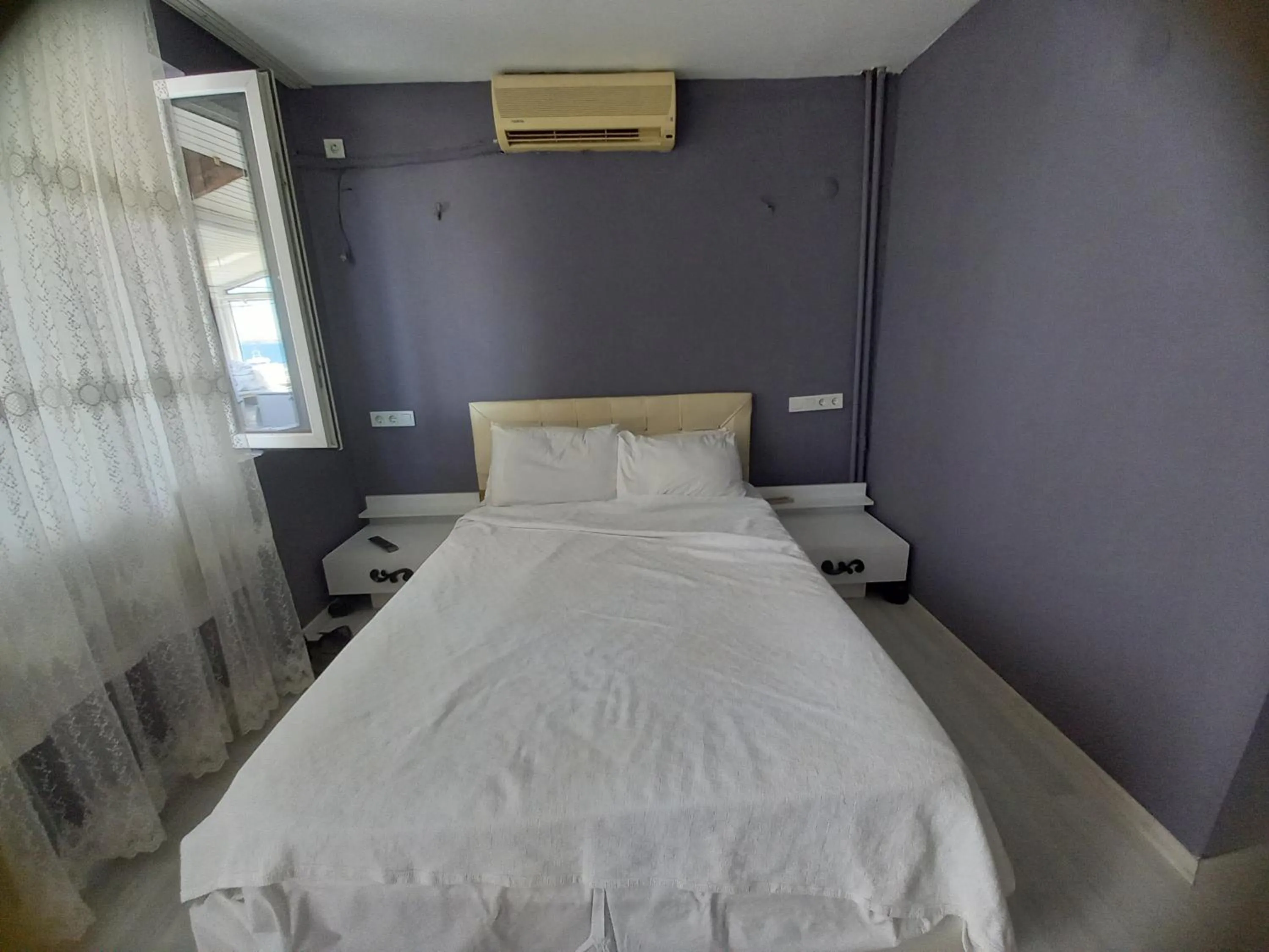 Photo of the whole room, Bed in Dilmac Hotel