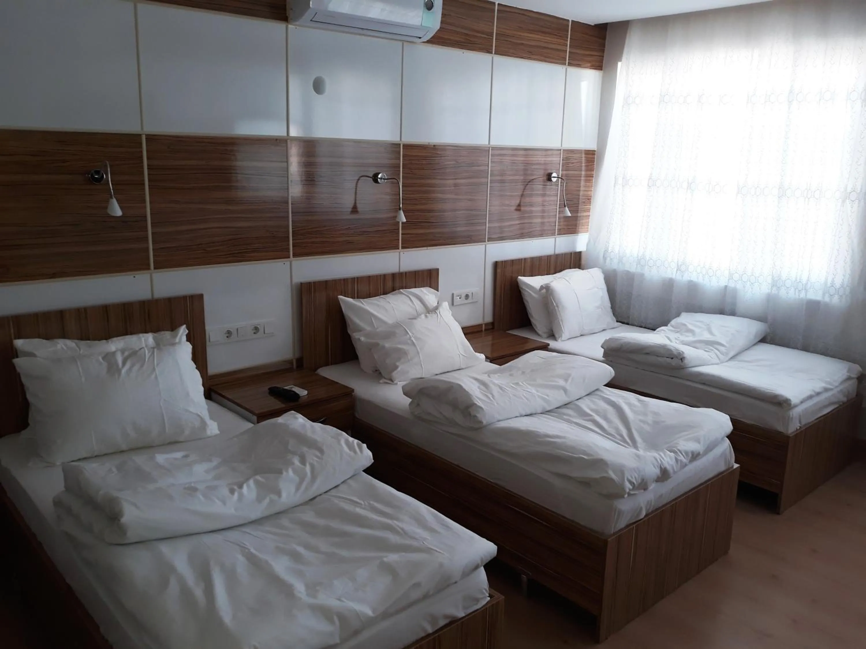 Comfort Quadruple Room - single occupancy in Dilmac Hotel