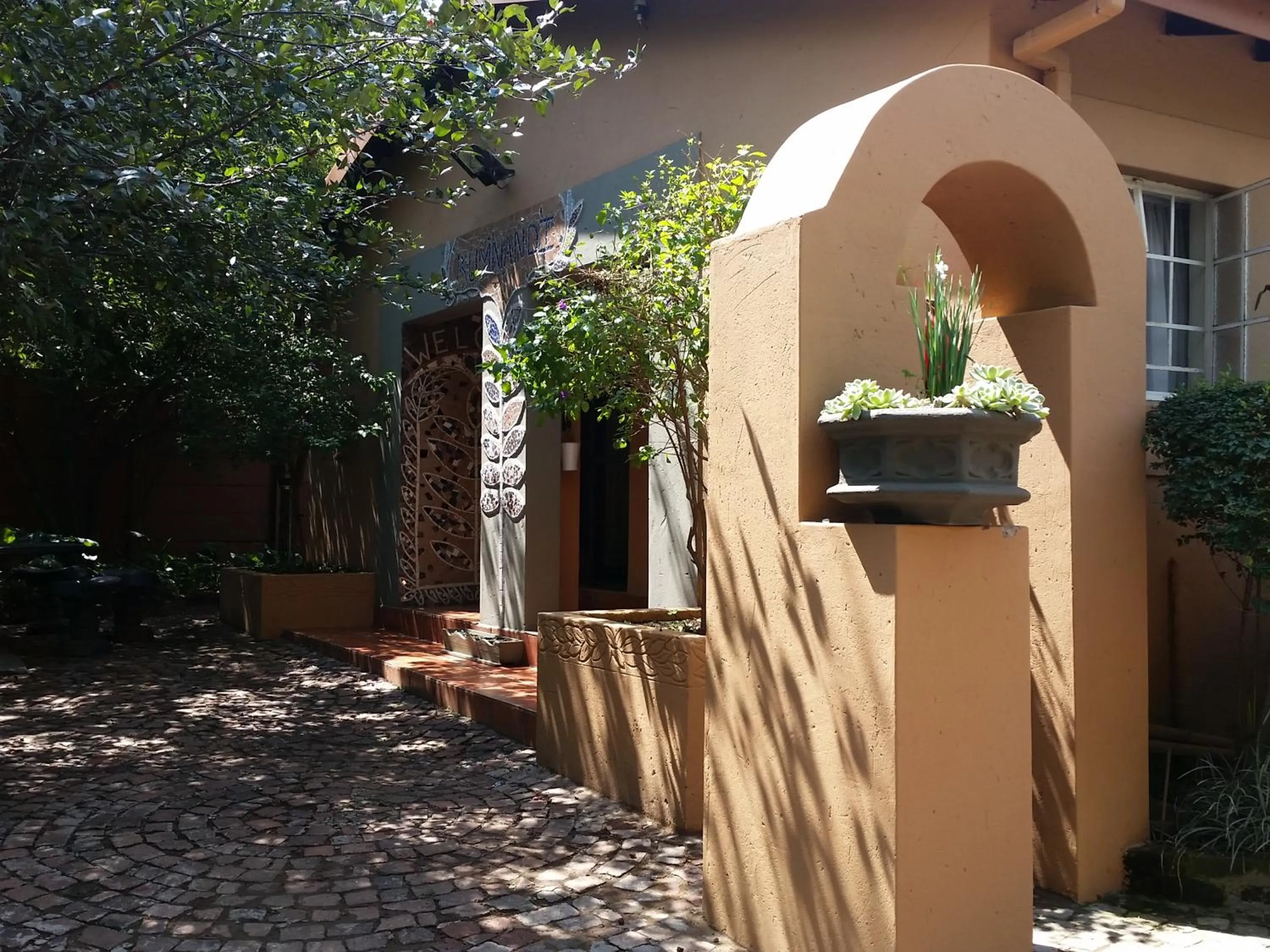 Garden view in Izimbali Lodge and Restaurant