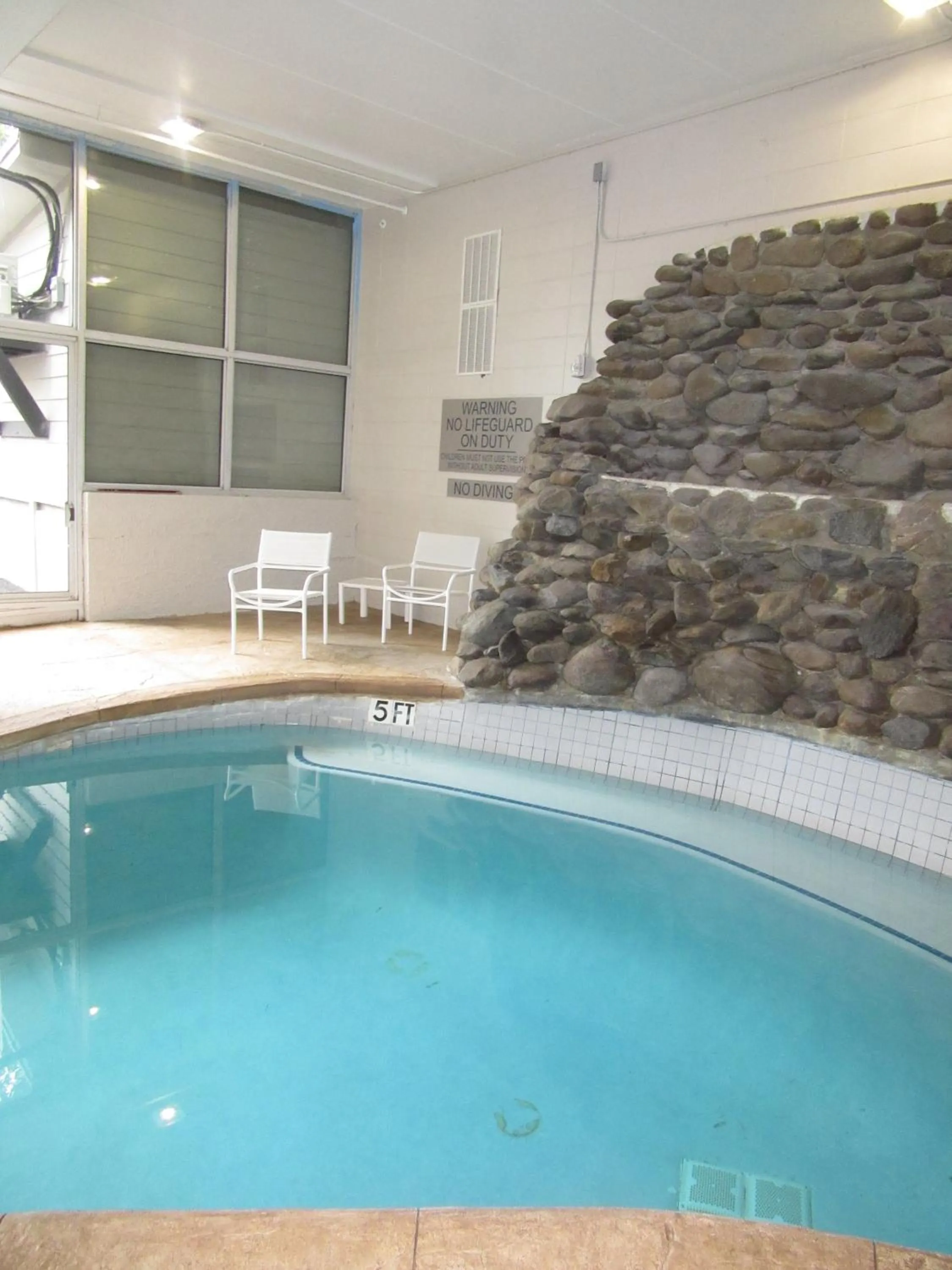 Swimming pool in Country Inn & Suites Downtown Convention Center by Radisson, Gatlinburg, TN
