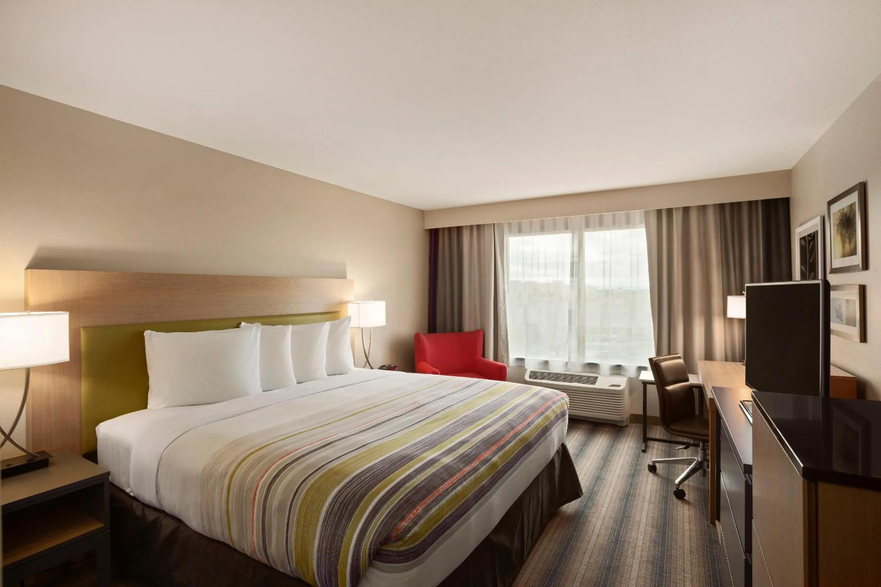 Photo of the whole room, Bed in Country Inn & Suites Downtown Convention Center by Radisson, Gatlinburg, TN