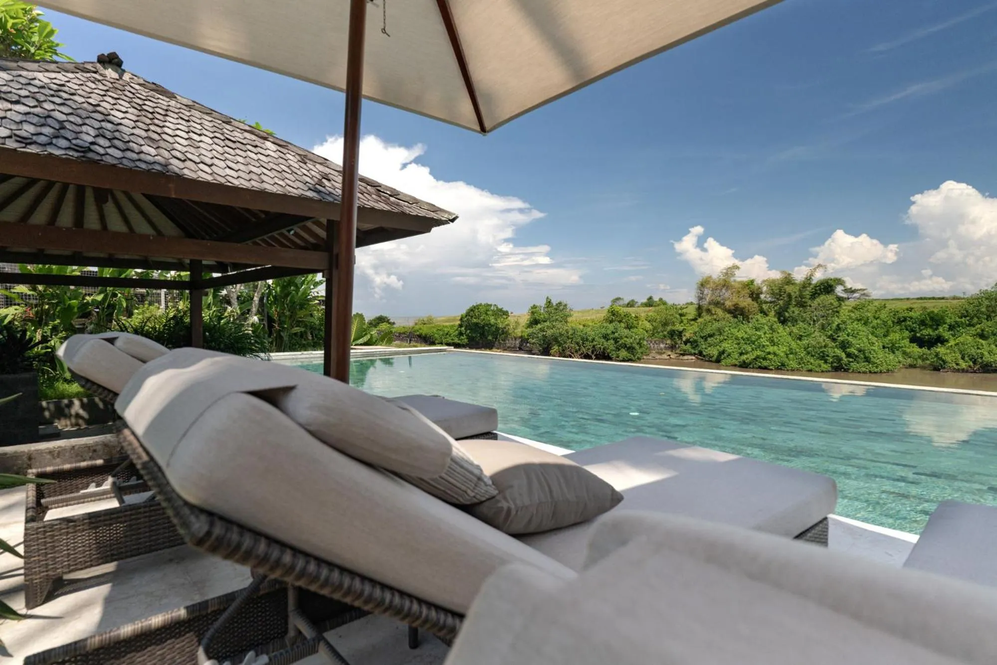 Swimming pool in OMEKAI Cemagi by Nakula