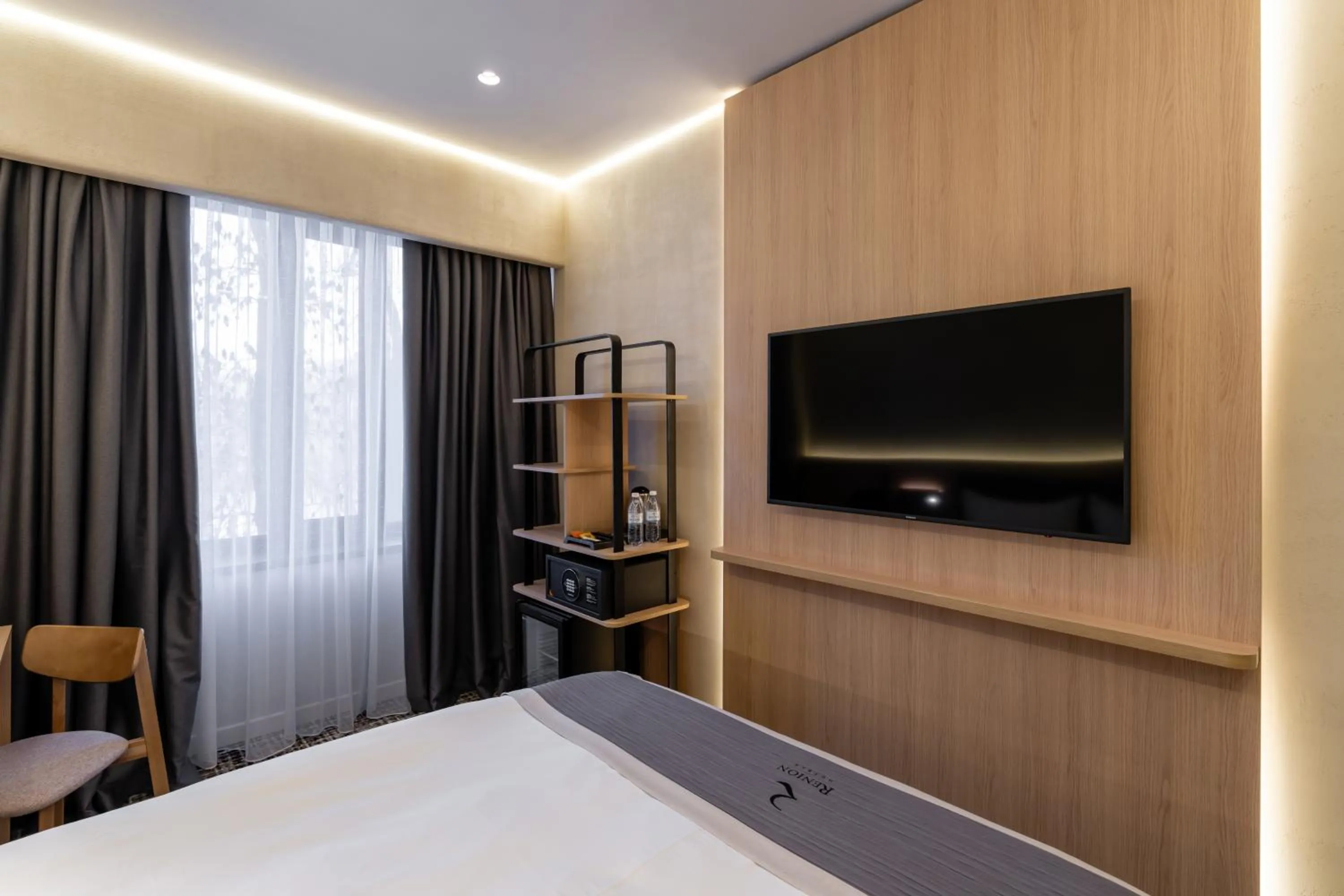 Bed in Renion City Hotel