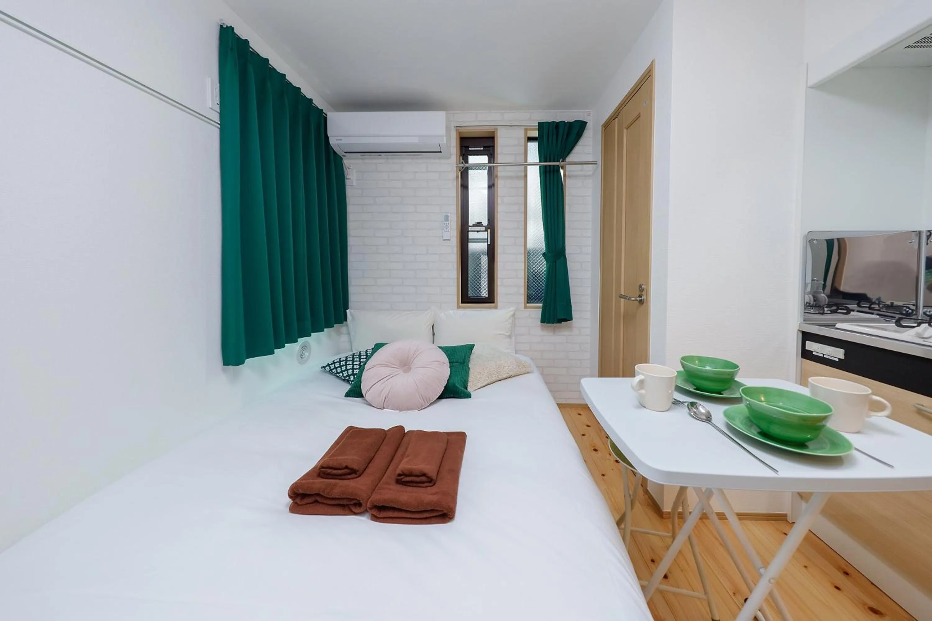 Bed in Zenith Shinjuku Hinoki by Tranova