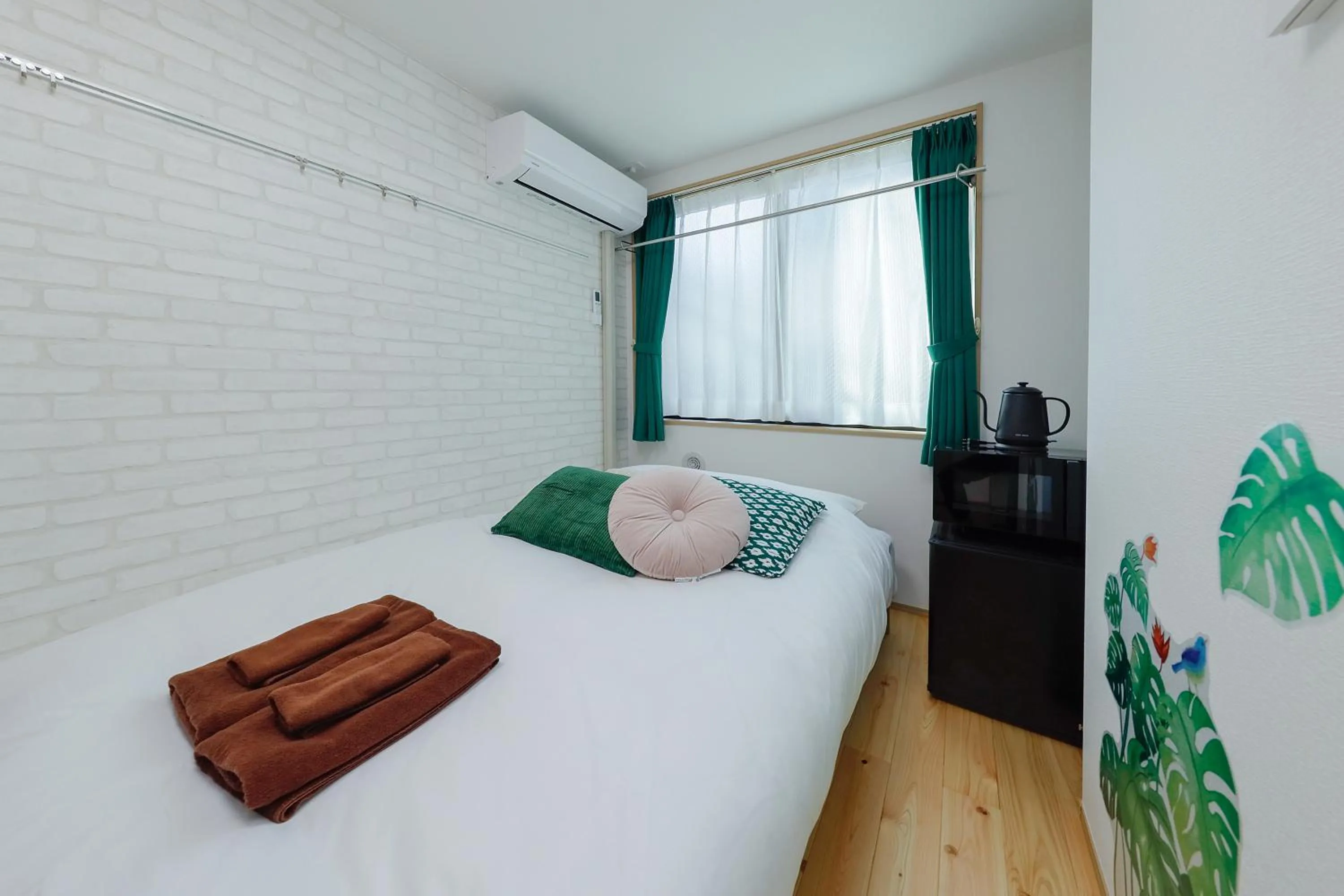 Bed in Zenith Shinjuku Hinoki by Tranova