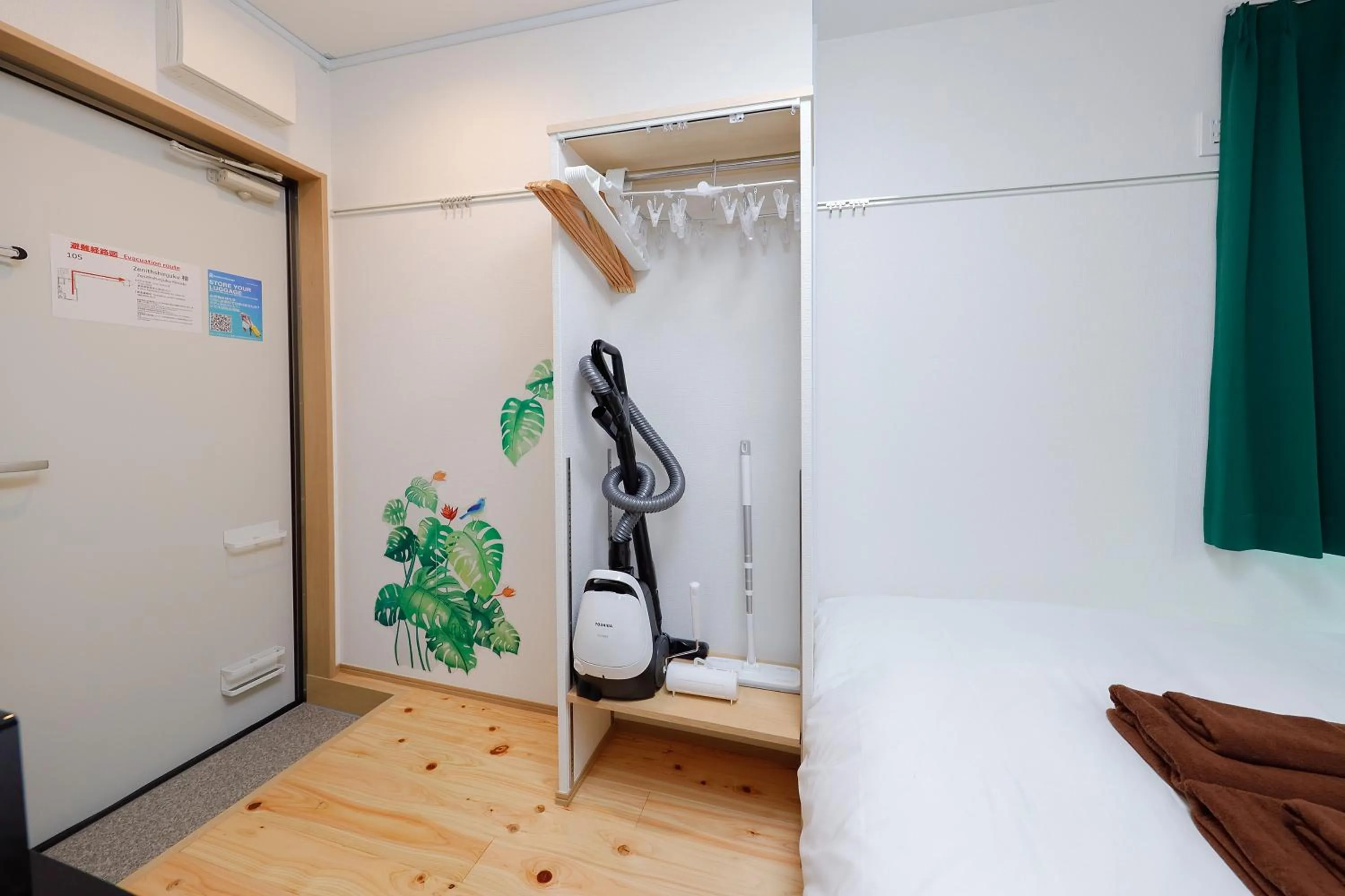 Bed in Zenith Shinjuku Hinoki by Tranova