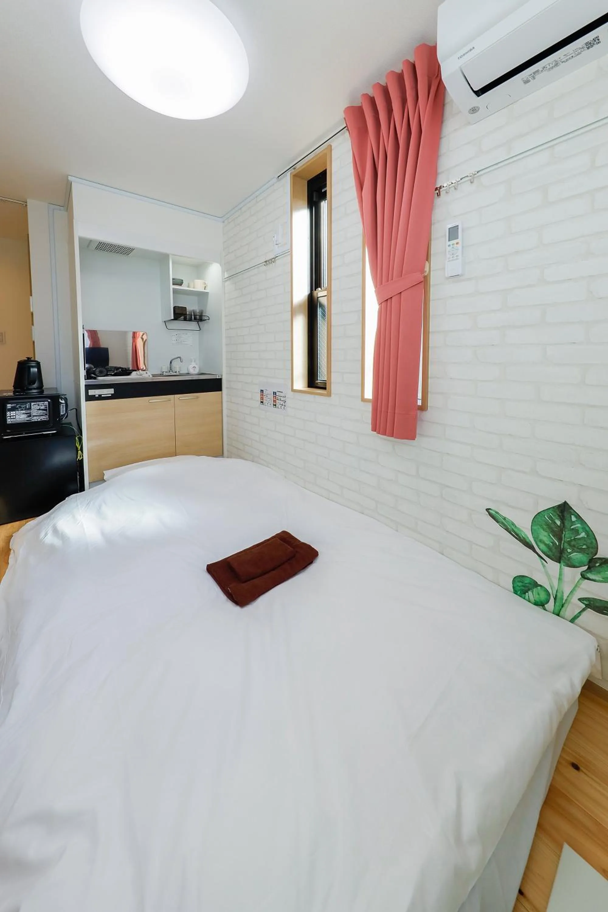 Bed in Zenith Shinjuku Hinoki by Tranova